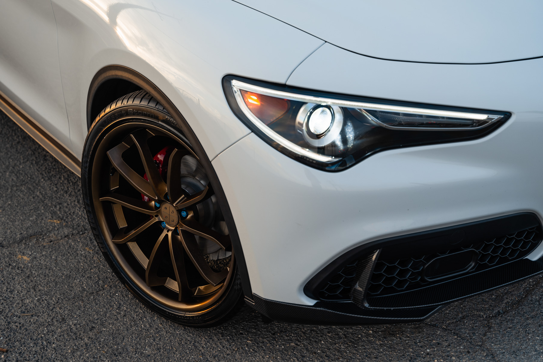 A 2020 Alfa Romeo Stelvio on Blaque Diamond BD-23 Custom Bronze Finish Wheels