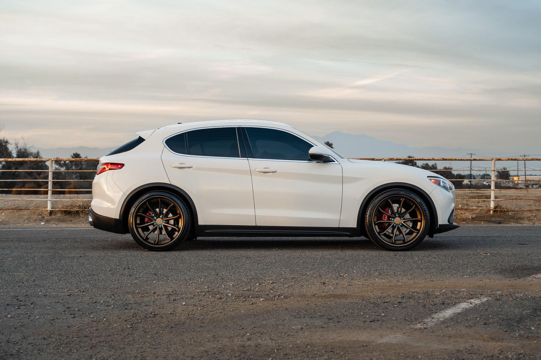 A 2020 Alfa Romeo Stelvio on Blaque Diamond BD-23 Custom Bronze Finish Wheels