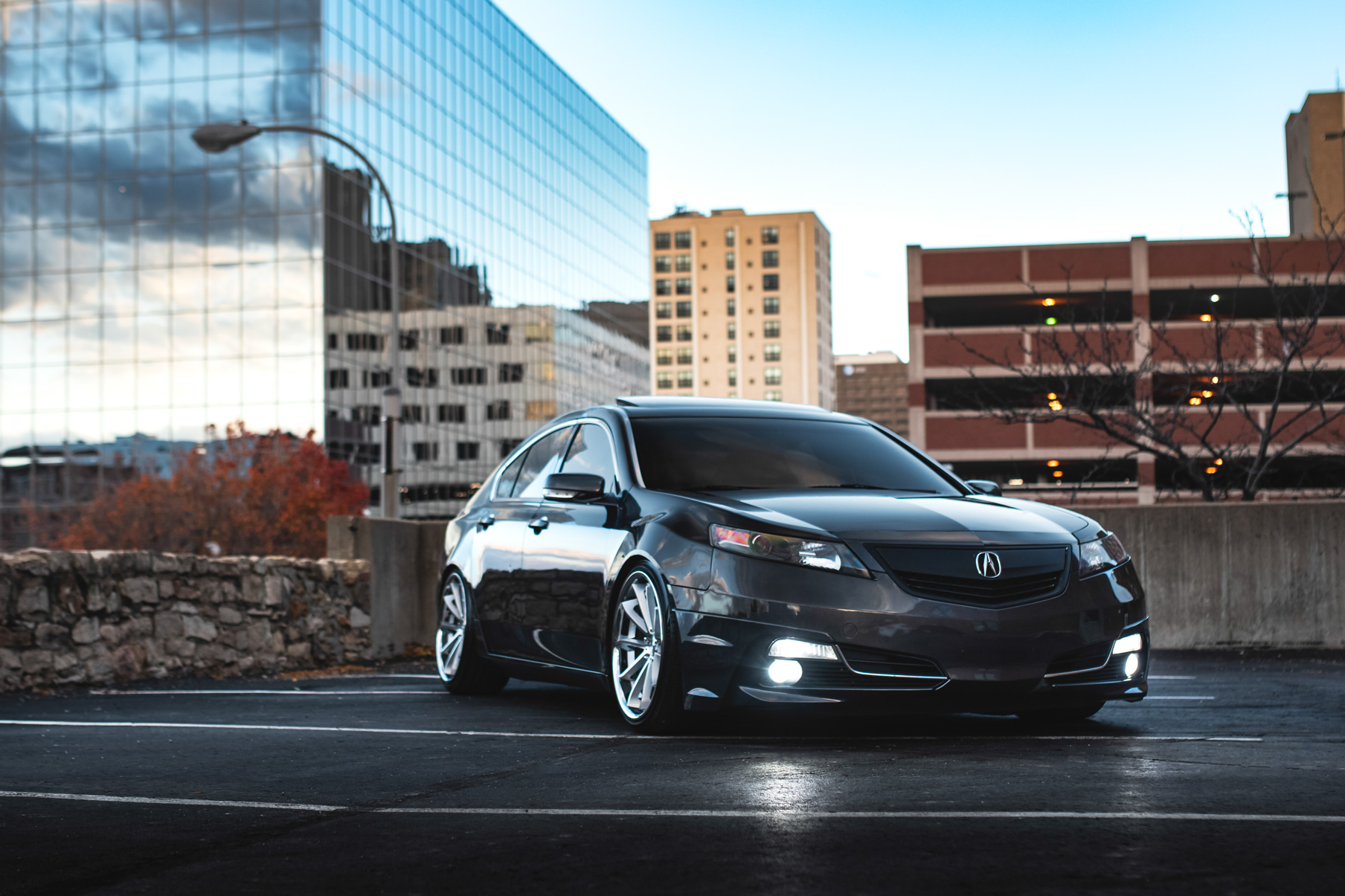 A 2012 Acura TL on Blaque Diamond BD-23 Machined Silver with Chrome Lip Wheels