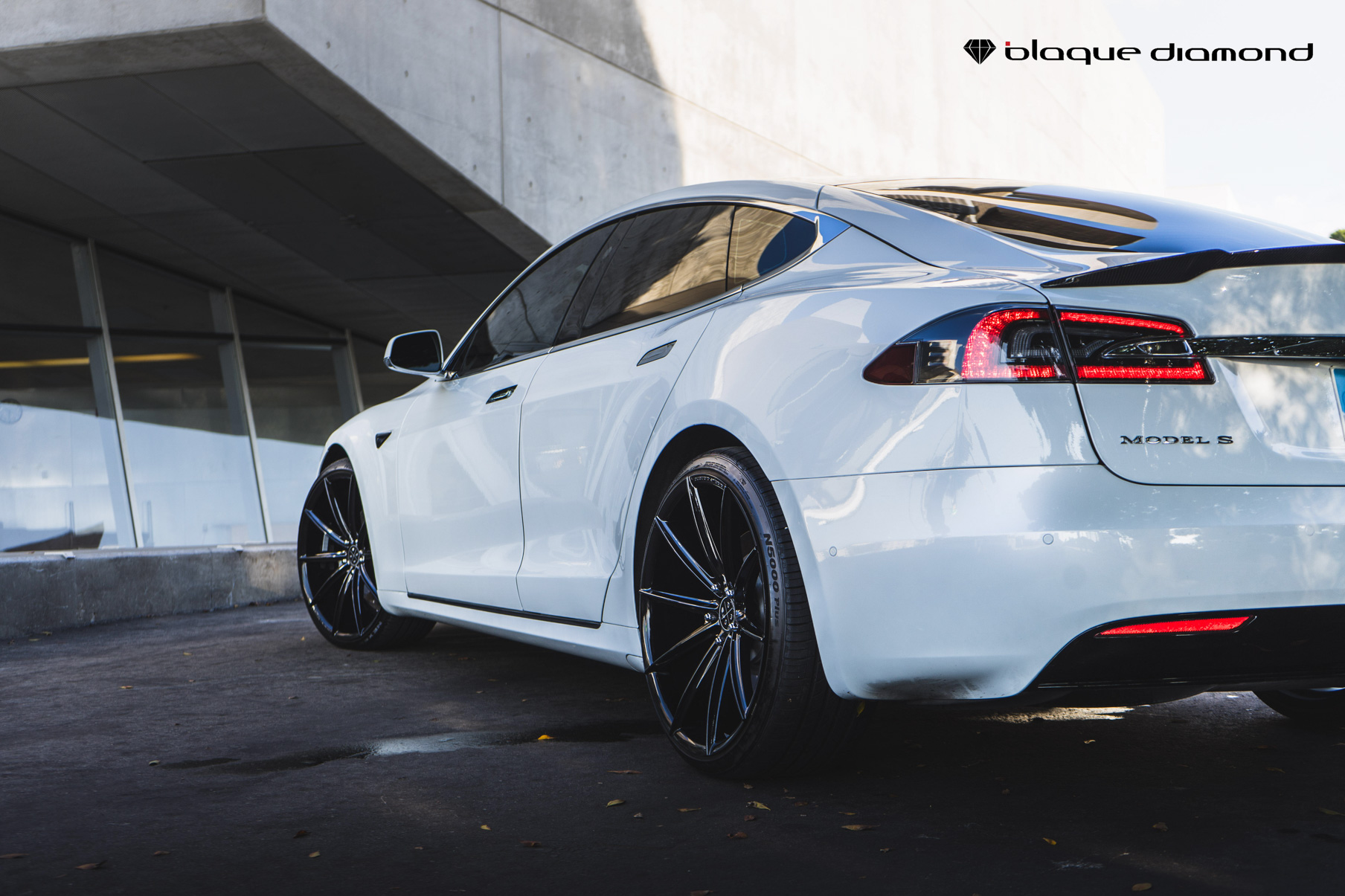 A 2018 Tesla S on 20 Inch Blaque Diamond BD-11 Gloss Black Wheels
