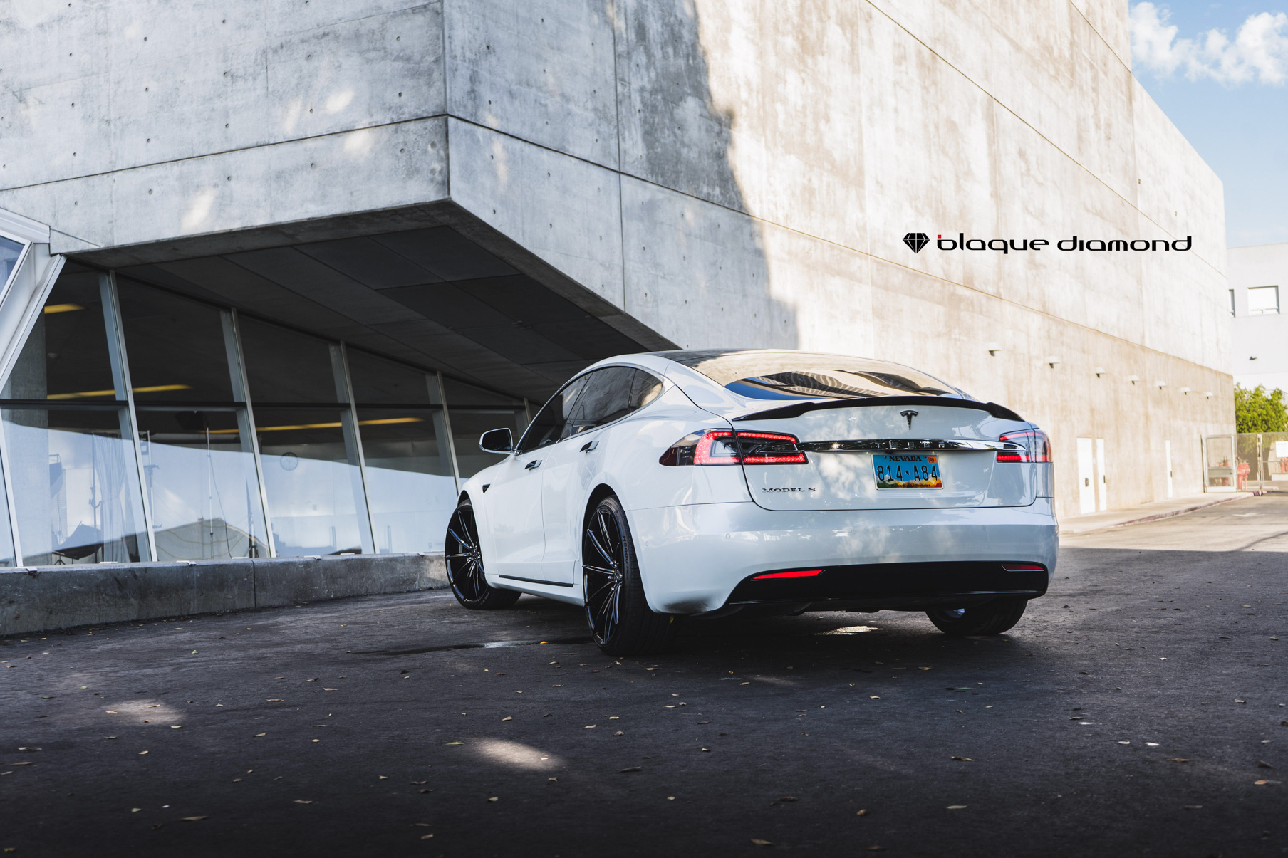 A 2018 Tesla S on 20 Inch Blaque Diamond BD-11 Gloss Black Wheels
