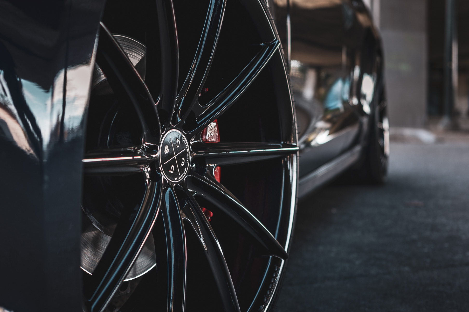 A 2016 Tesla Model S on 20 Inch Blaque Diamond BD-11 Gloss Black Wheels