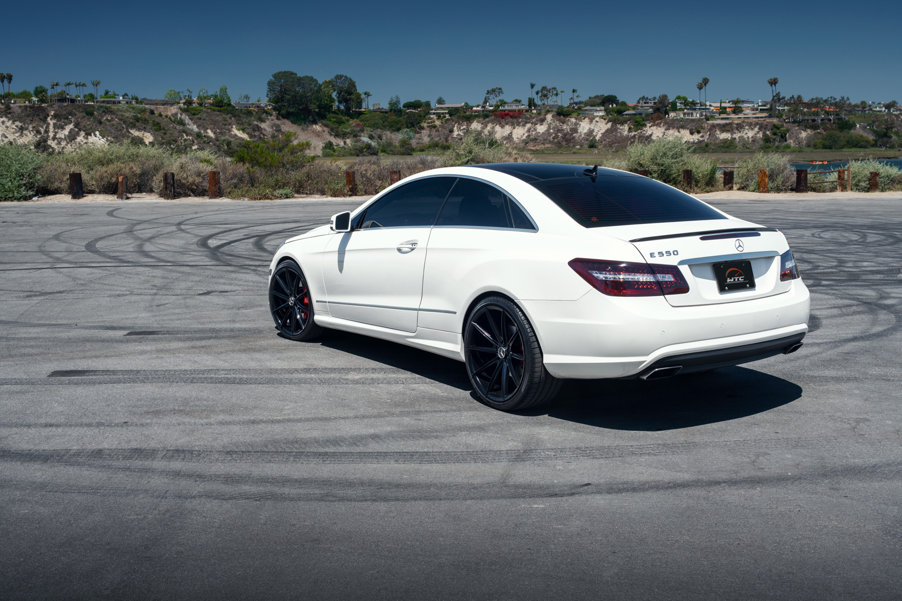 A 2015 Mercedes-Benz E550 on 20 Inch Blaque Diamond BD-11 Gloss Black Wheels