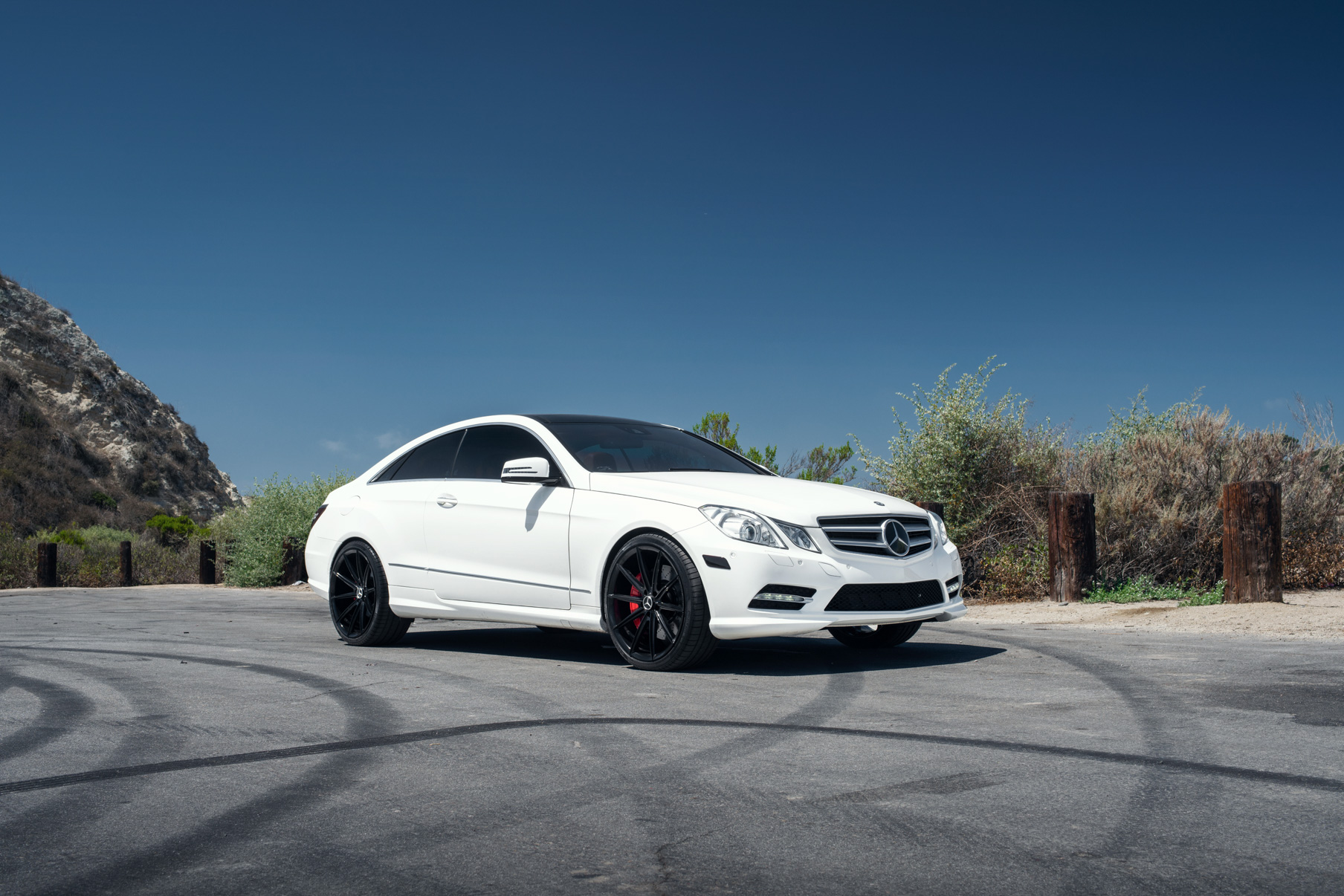 A 2015 Mercedes-Benz E550 on 20 Inch Blaque Diamond BD-11 Gloss Black Wheels