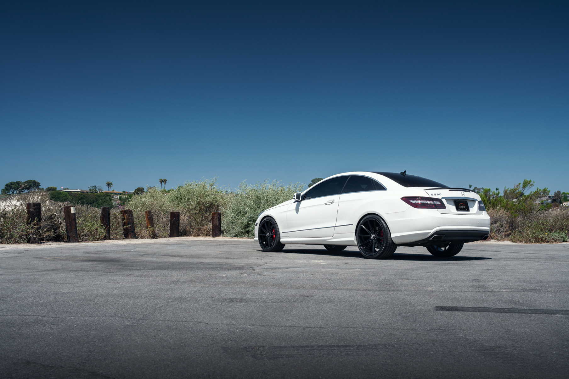 A 2015 Mercedes-Benz E550 on 20 Inch Blaque Diamond BD-11 Gloss Black Wheels