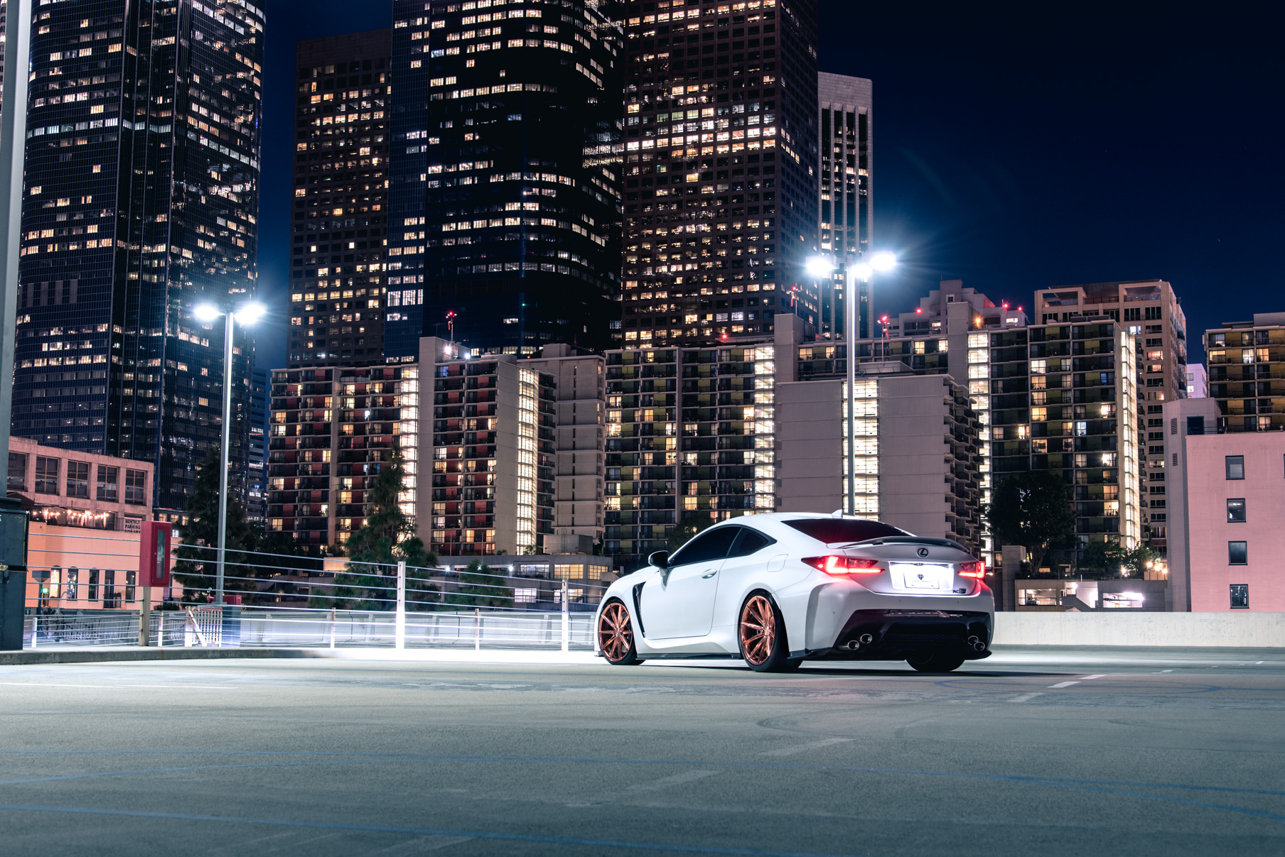 A White 2016 Lexus RCF on 20 Inch Blaque Diamond BD-11 Polished Rose Gold Wheels