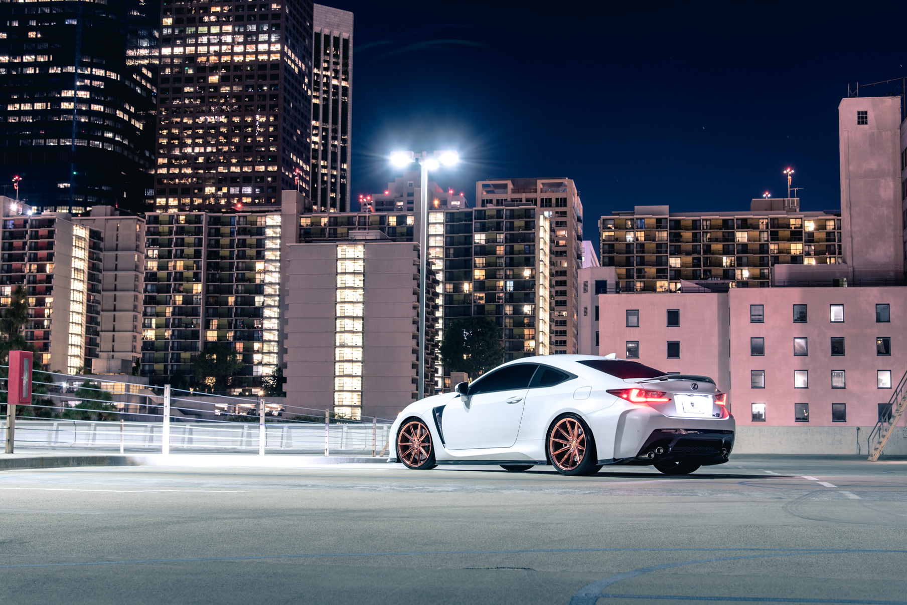 A White 2016 Lexus RCF on 20 Inch Blaque Diamond BD-11 Polished Rose Gold Wheels