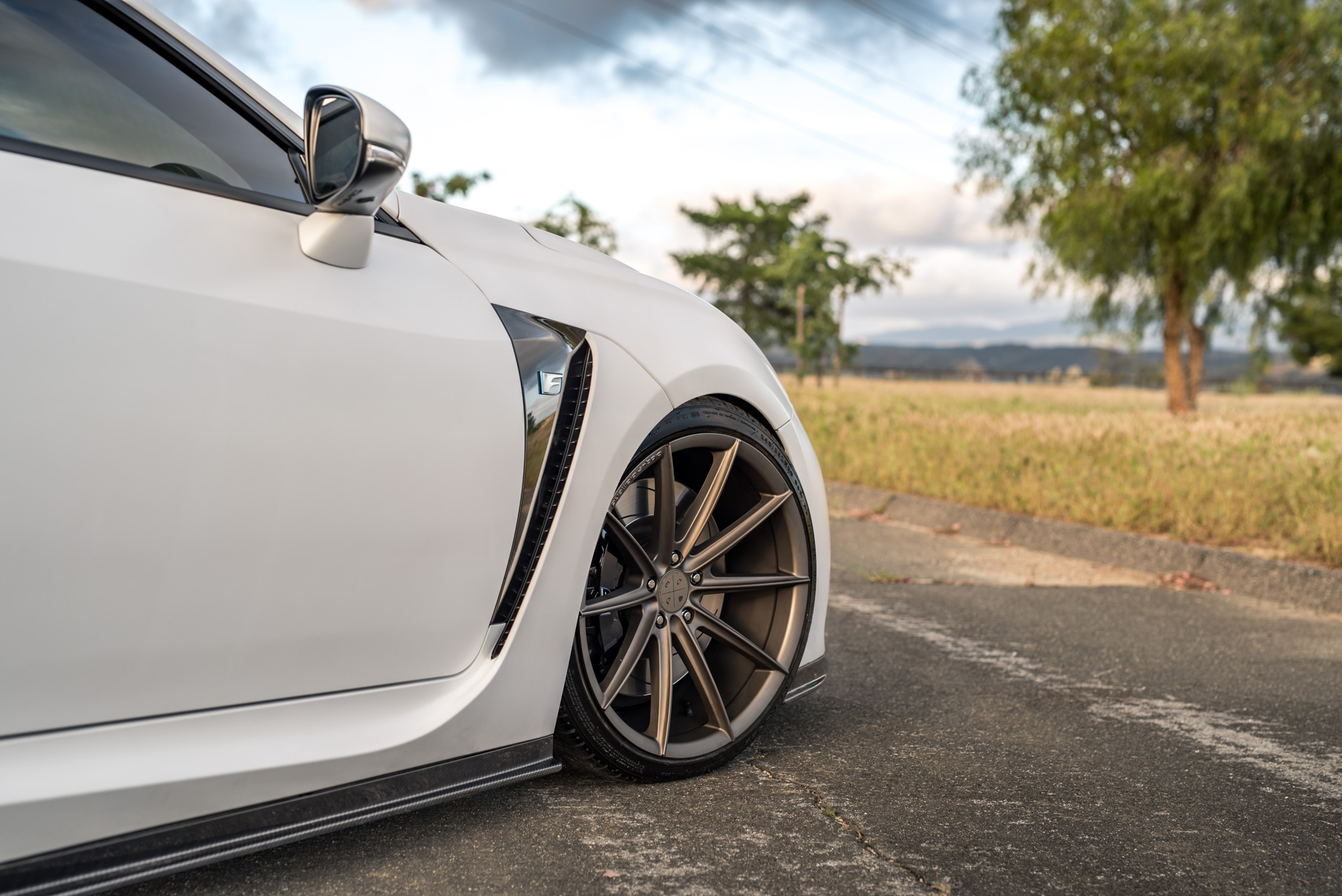 A White 2016 Lexus RCF on 20 Inch Blaque Diamond BD-11 Polished Rose Gold Wheels