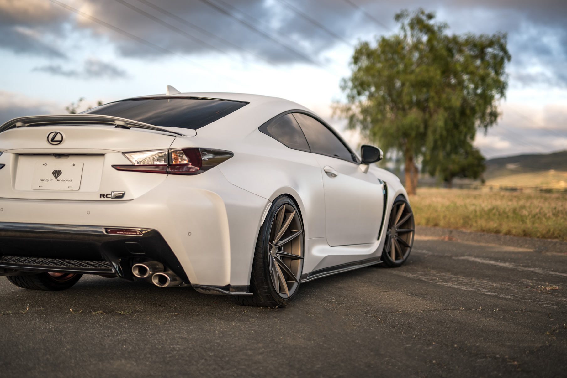 A White 2016 Lexus RCF on 20 Inch Blaque Diamond BD-11 Polished Rose Gold Wheels