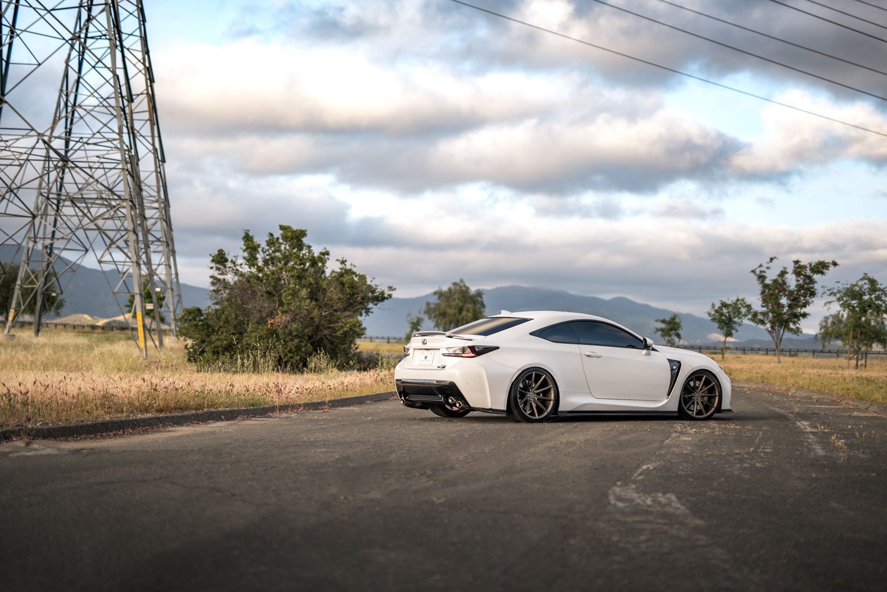 A White 2016 Lexus RCF on 20 Inch Blaque Diamond BD-11 Polished Rose Gold Wheels