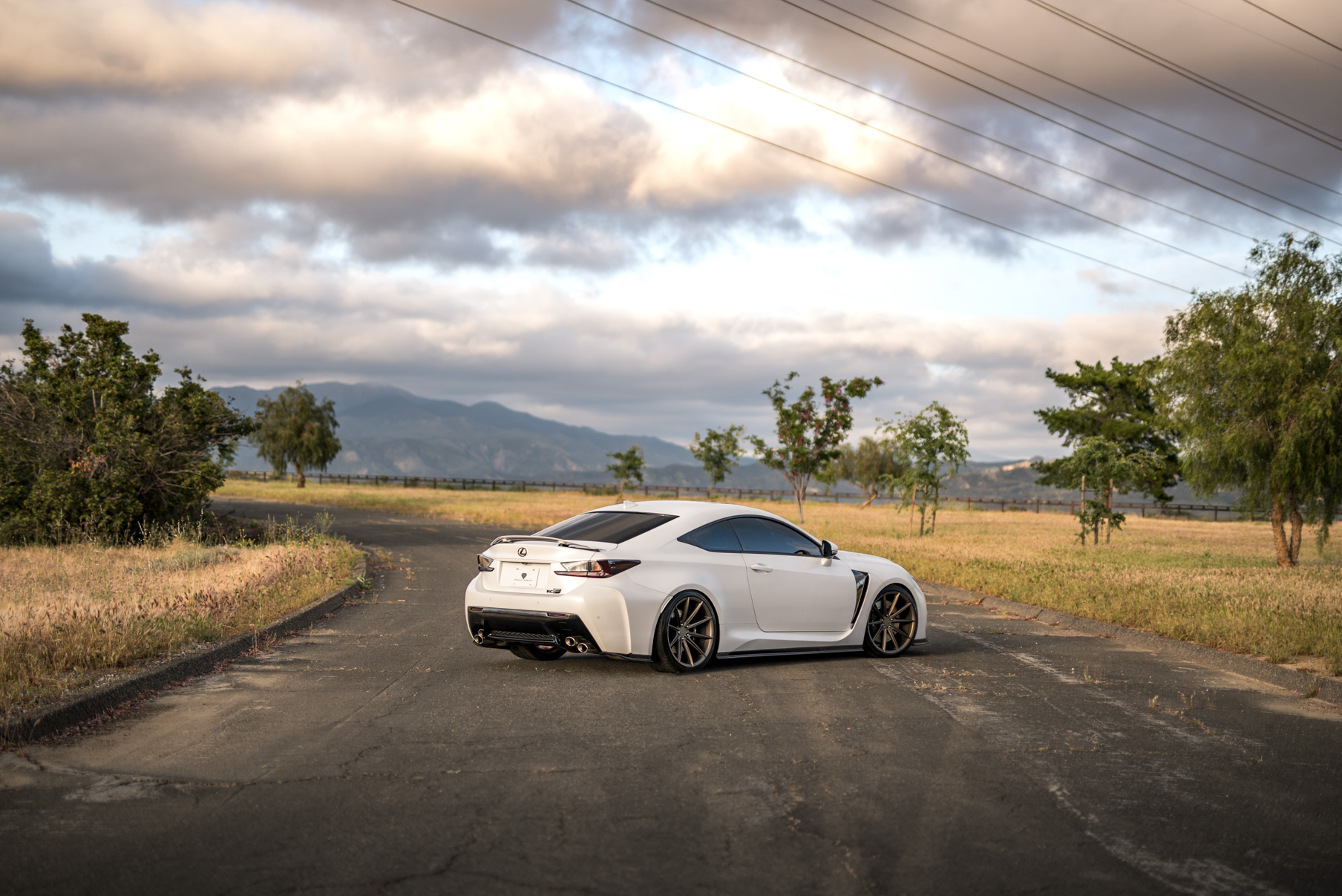 A White 2016 Lexus RCF on 20 Inch Blaque Diamond BD-11 Polished Rose Gold Wheels