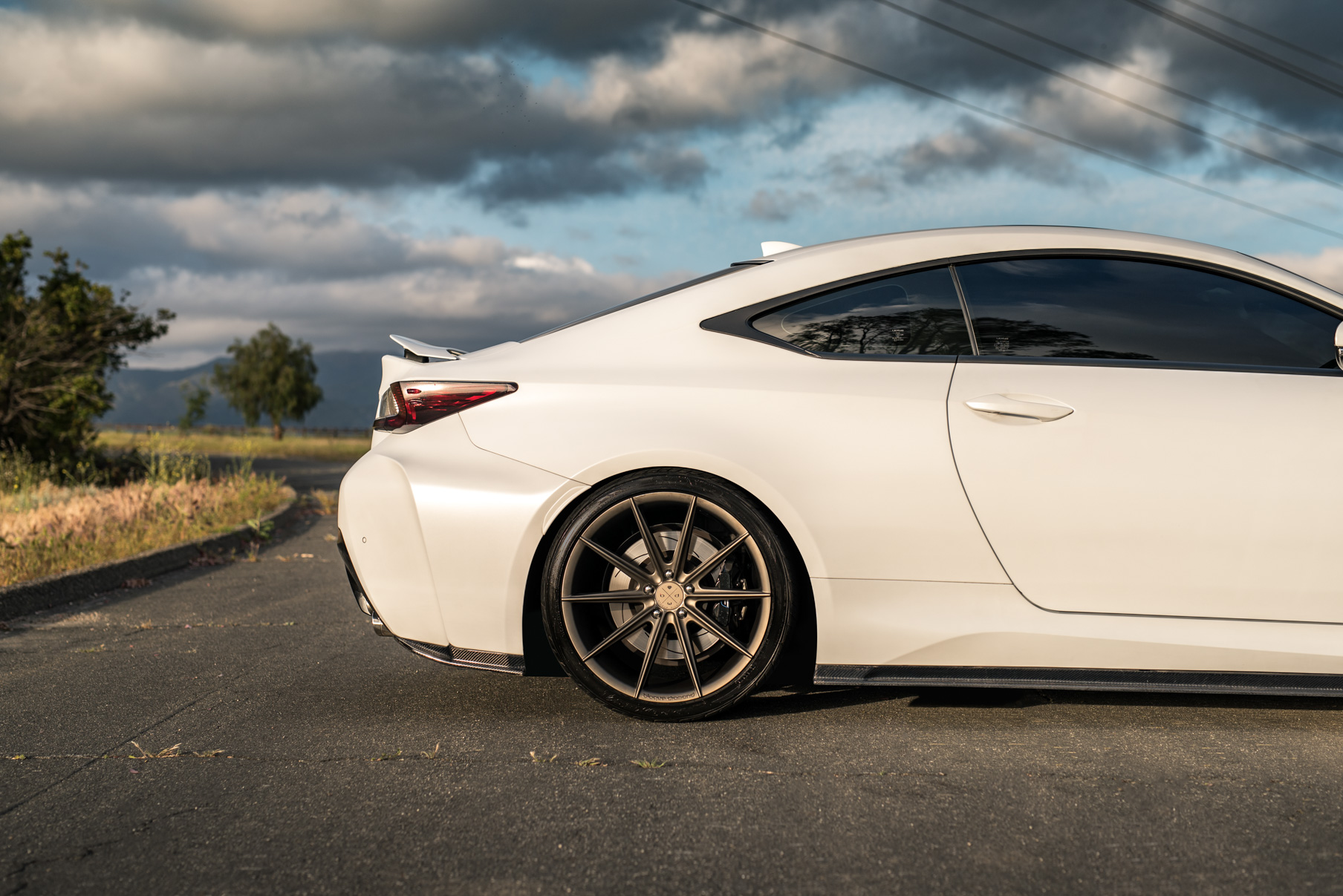 A White 2016 Lexus RCF on 20 Inch Blaque Diamond BD-11 Polished Rose Gold Wheels