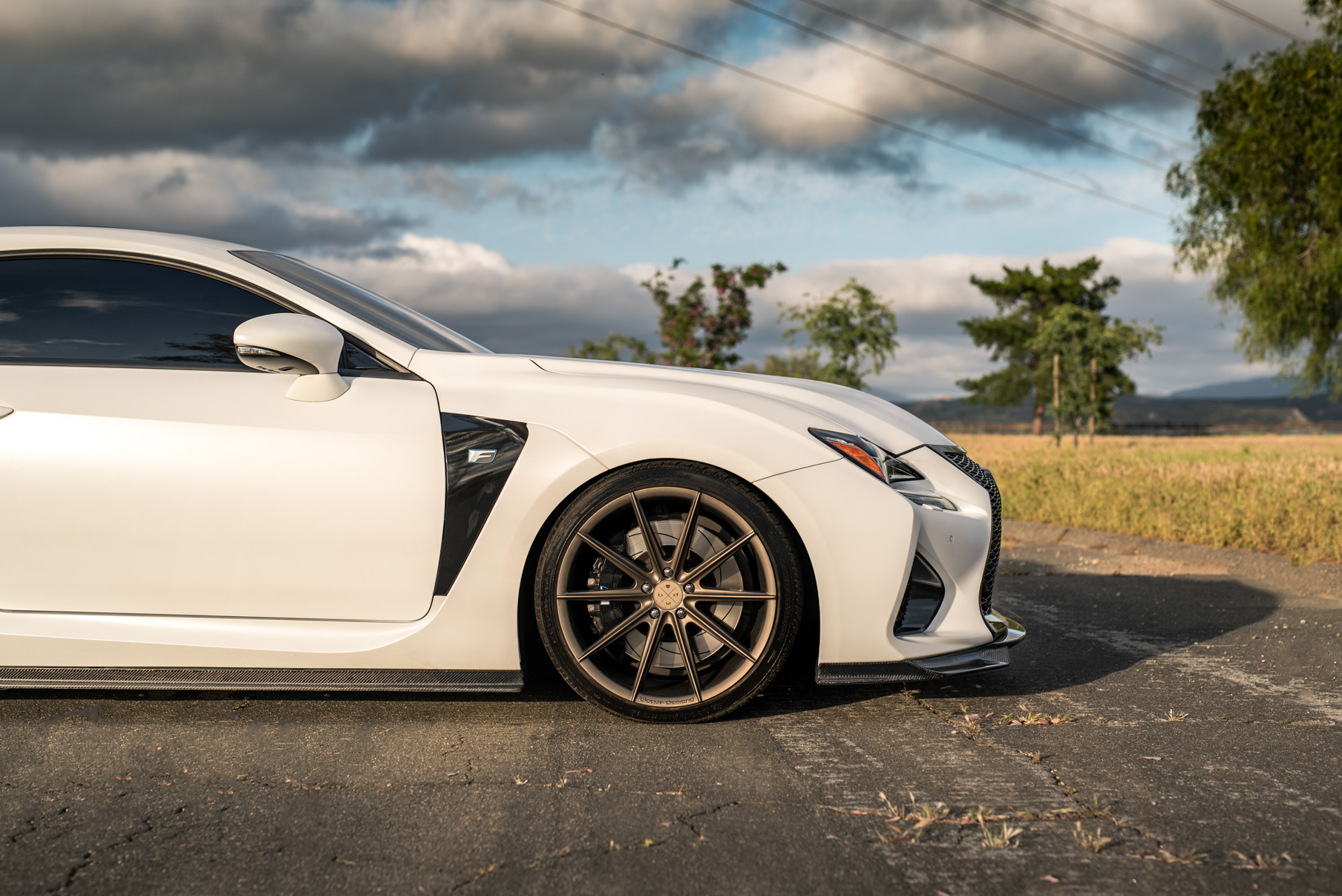 A White 2016 Lexus RCF on 20 Inch Blaque Diamond BD-11 Polished Rose Gold Wheels