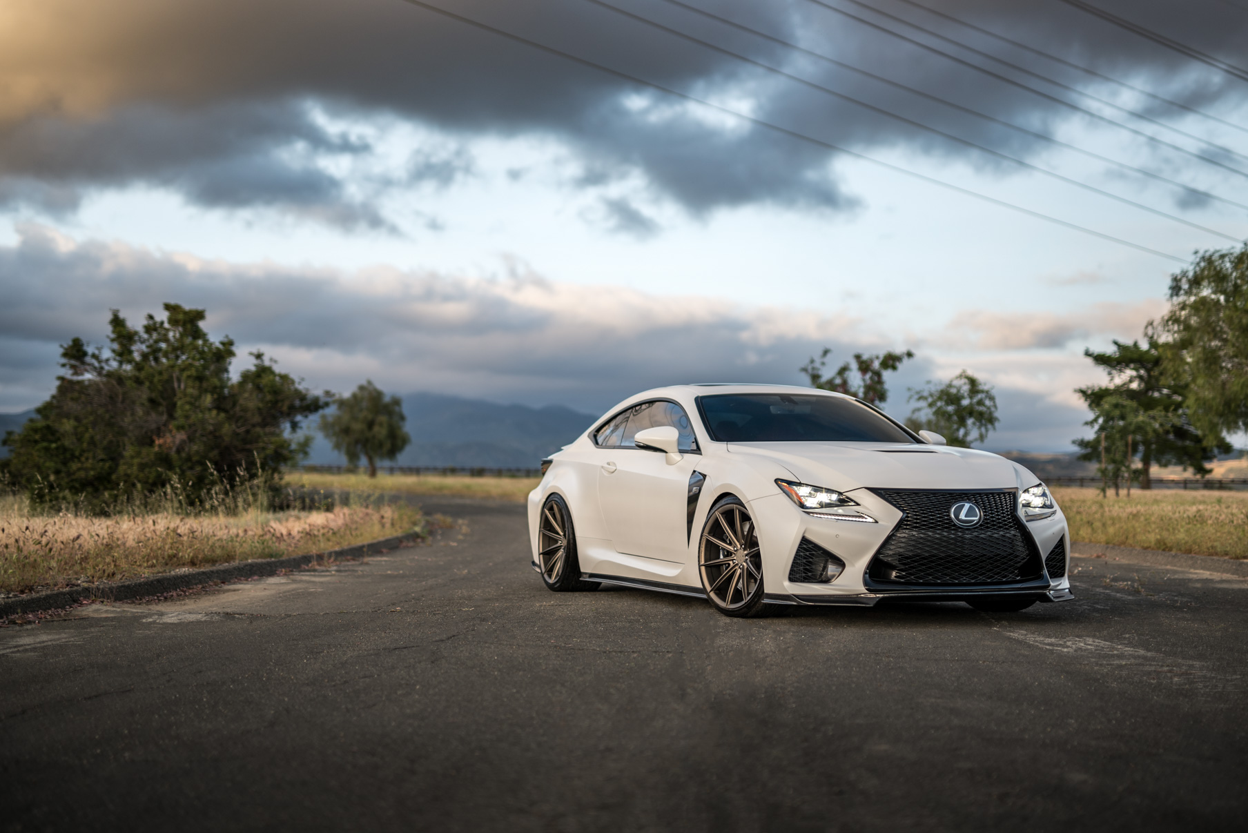 A White 2016 Lexus RCF on 20 Inch Blaque Diamond BD-11 Polished Rose Gold Wheels