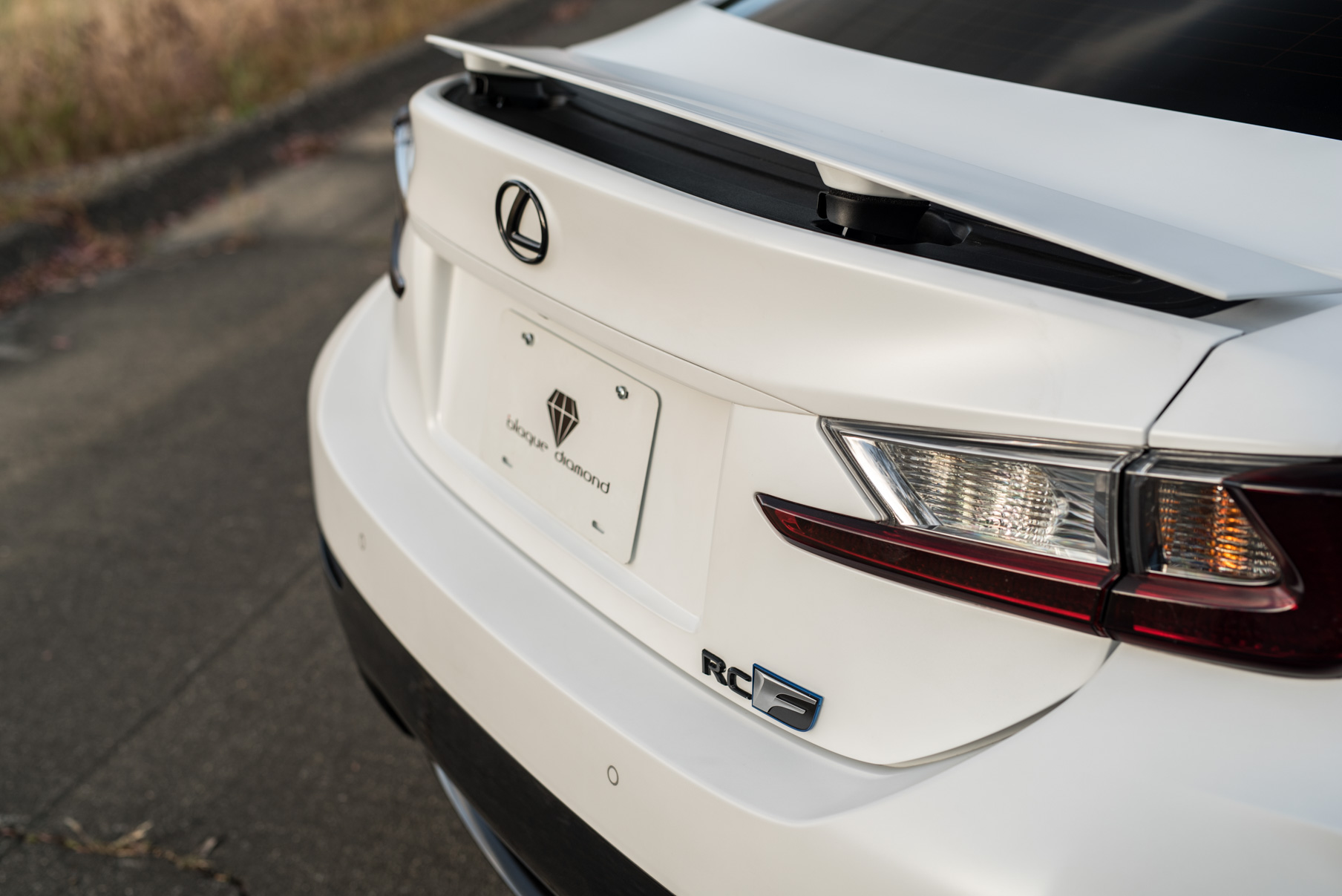 A White 2016 Lexus RCF on 20 Inch Blaque Diamond BD-11 Polished Rose Gold Wheels
