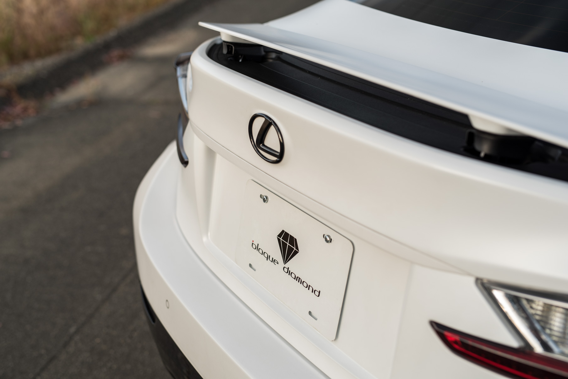 A White 2016 Lexus RCF on 20 Inch Blaque Diamond BD-11 Polished Rose Gold Wheels