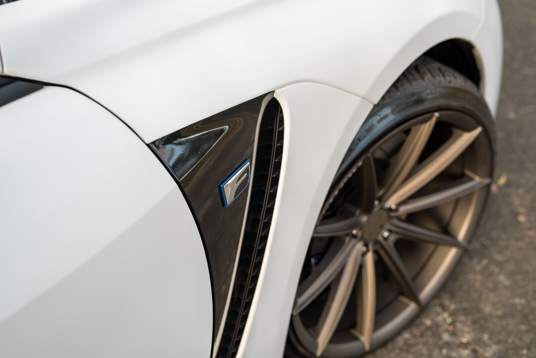 A White 2016 Lexus RCF on 20 Inch Blaque Diamond BD-11 Polished Rose Gold Wheels