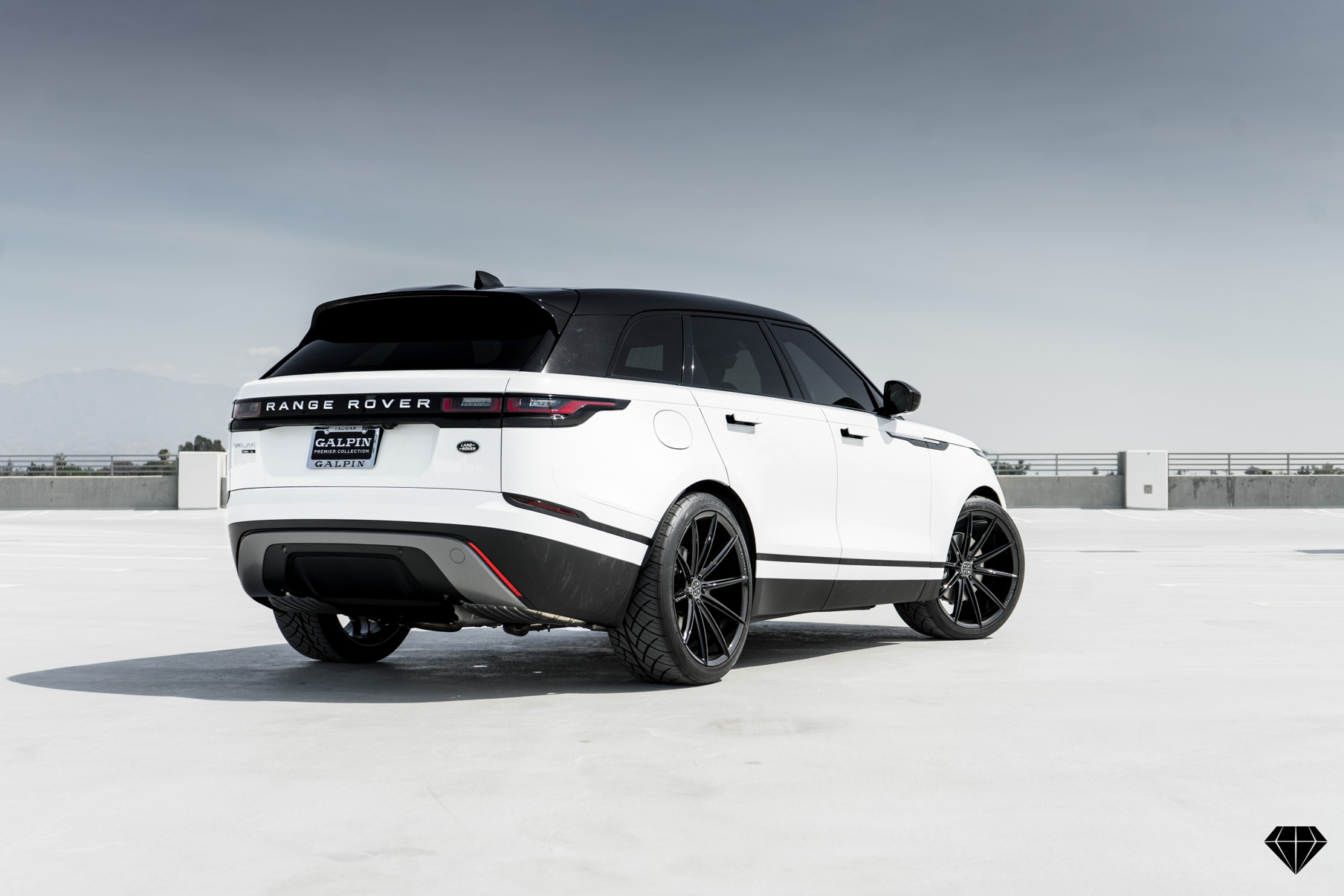 A 2018 Range Rover Velar on 22 Inch Blaque Diamond BD-11 Gloss Black Wheels