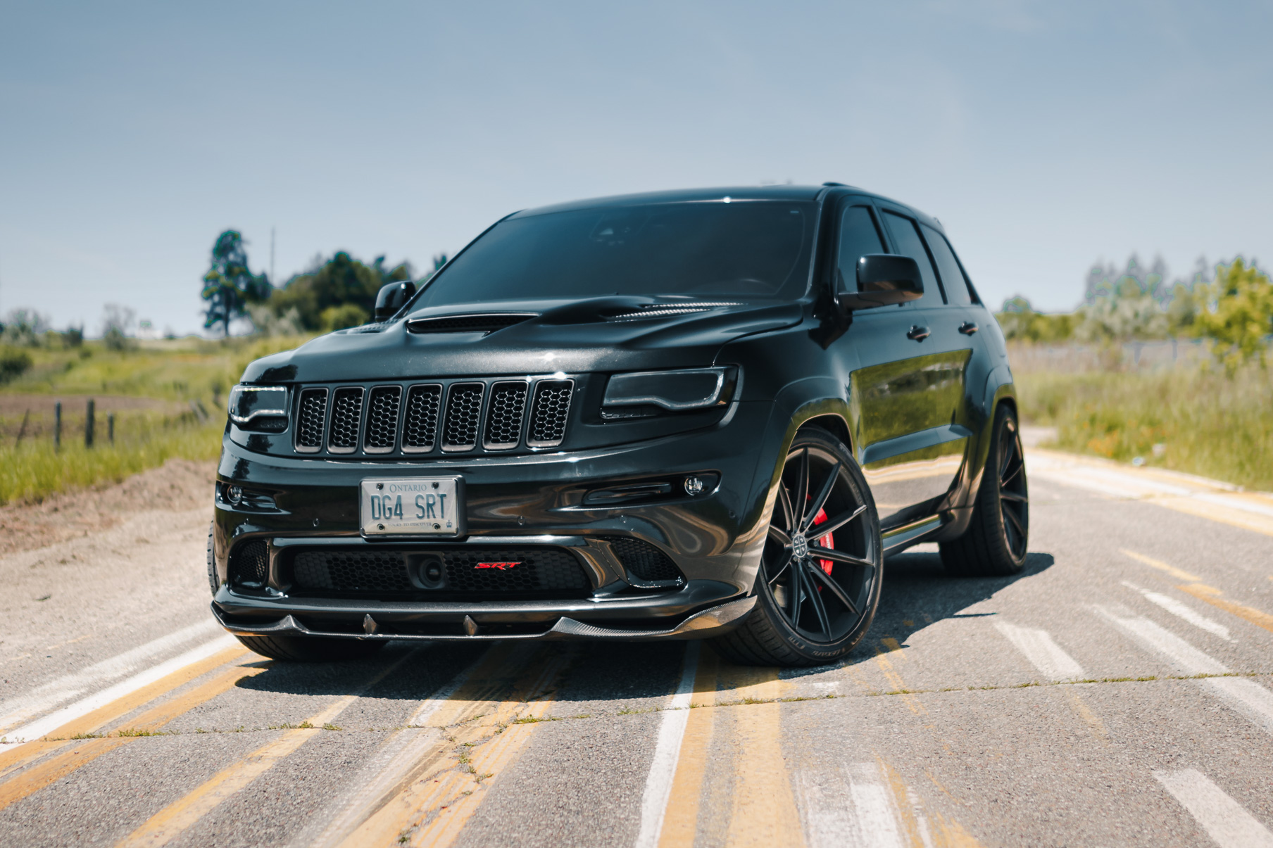 A 2016 Jeep SRT8 on 20 Inch Blaque Diamond BD-11 Gloss Black Wheels