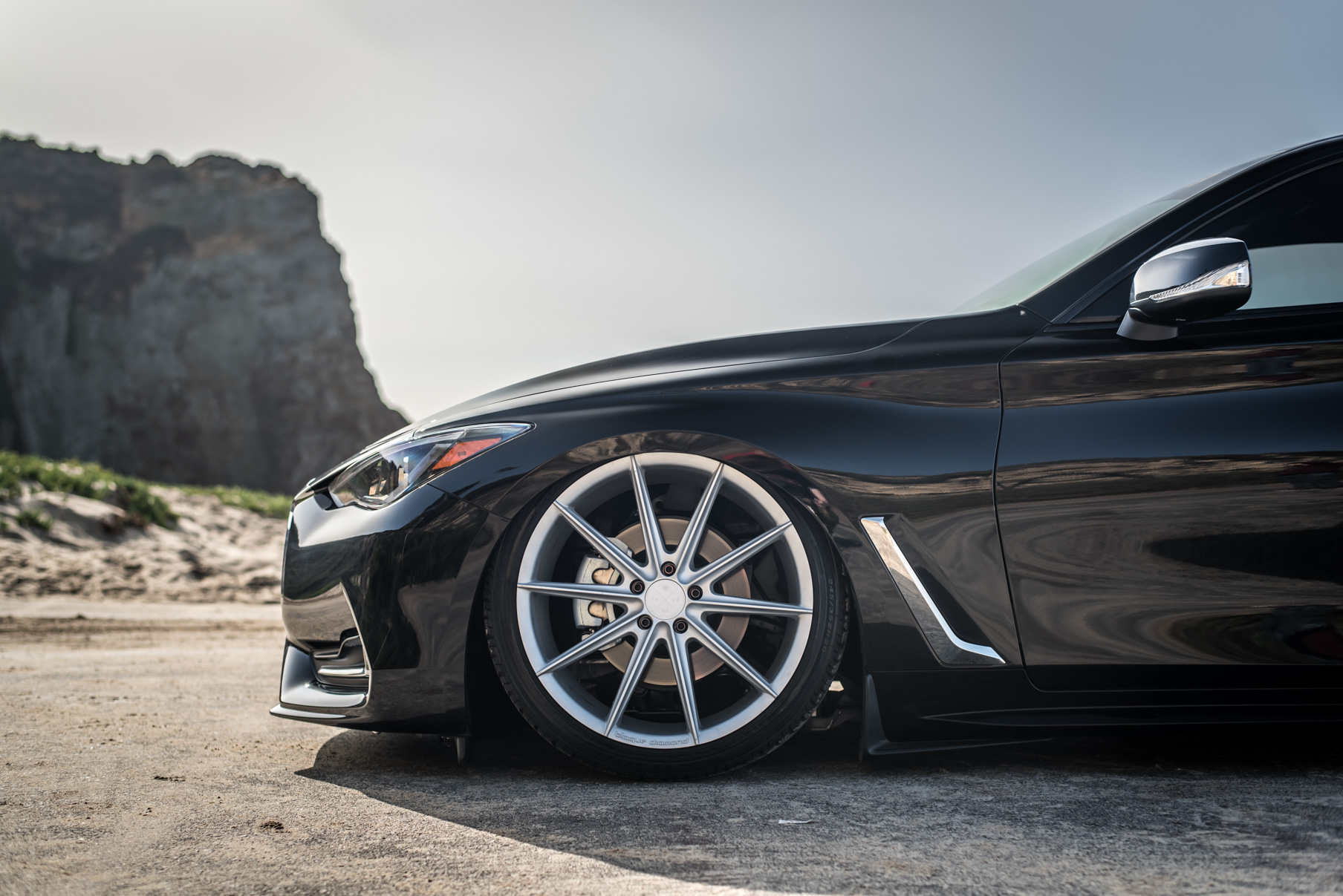 A 2017 Infinity Q60 on 20 Inch Blaque Diamond BD-11 Frozen Silver Wheels