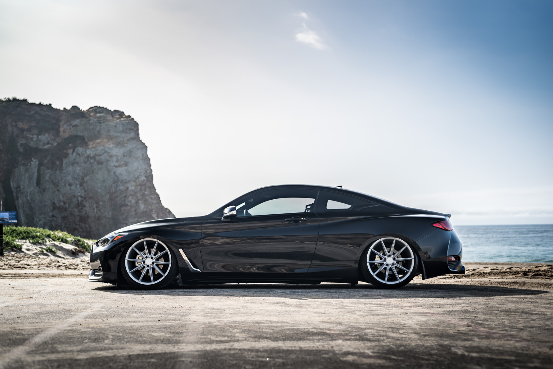 A 2017 Infinity Q60 on 20 Inch Blaque Diamond BD-11 Frozen Silver Wheels