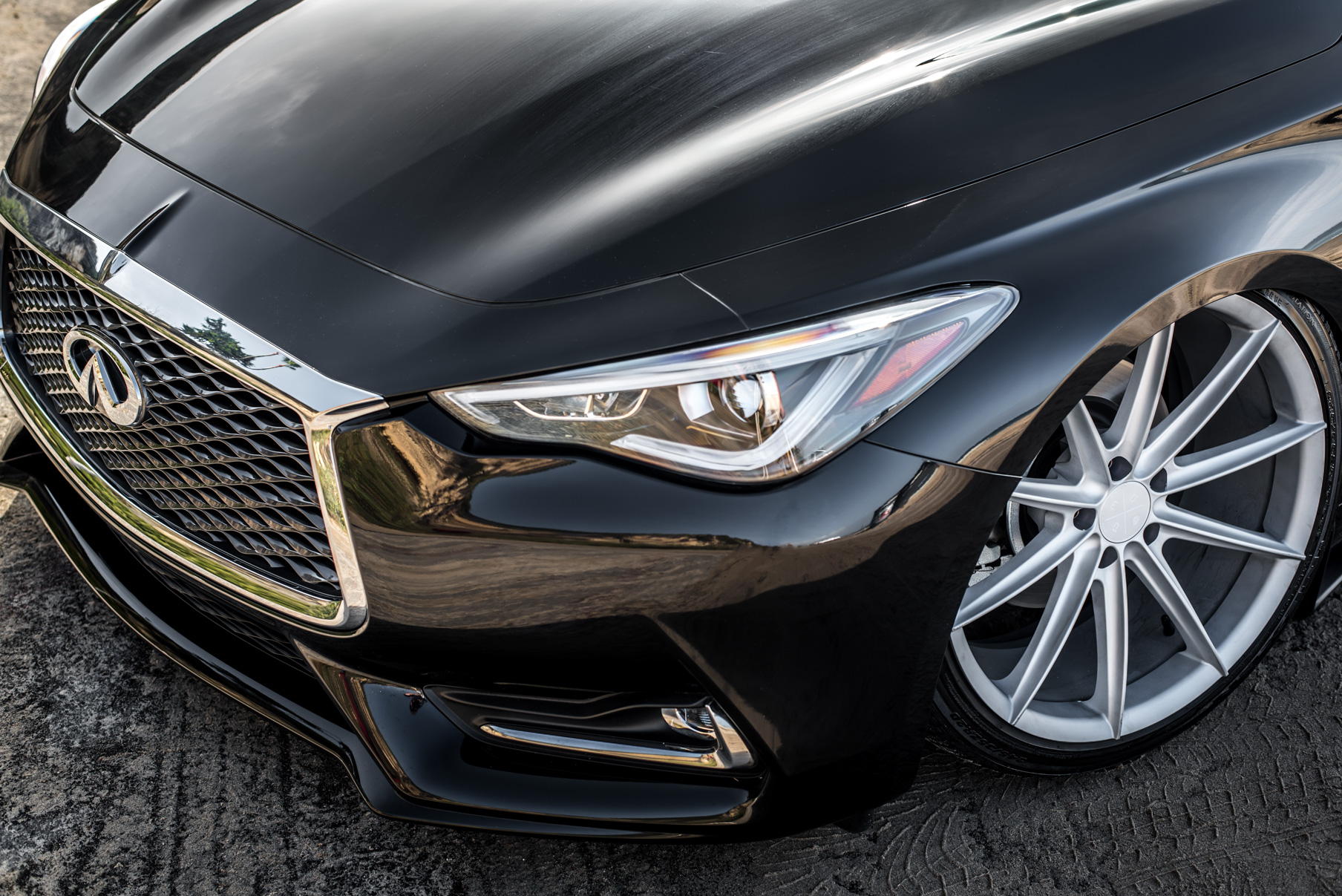 A 2017 Infinity Q60 on 20 Inch Blaque Diamond BD-11 Frozen Silver Wheels