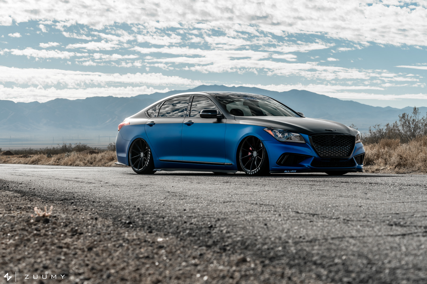 A 2015 Hyundai Genesis on 20 Inch Blaque Diamond BD-11 Gloss Black Wheels