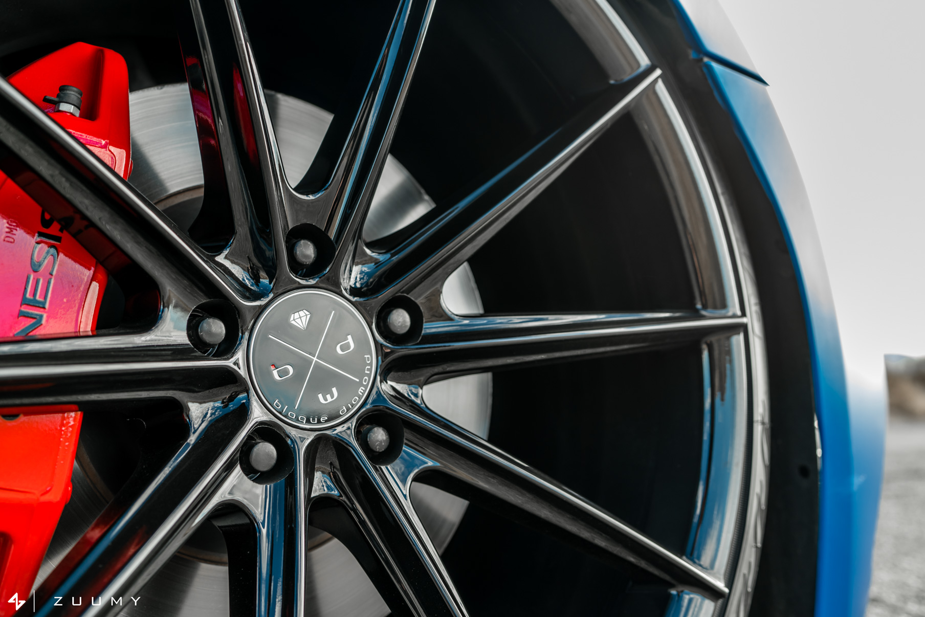 A 2015 Hyundai Genesis on 20 Inch Blaque Diamond BD-11 Gloss Black Wheels