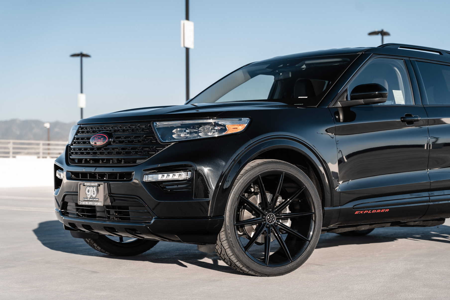 A 2021 Ford Explorer on 24 Inch Blaque Diamond BD-11 Gloss Black Wheels