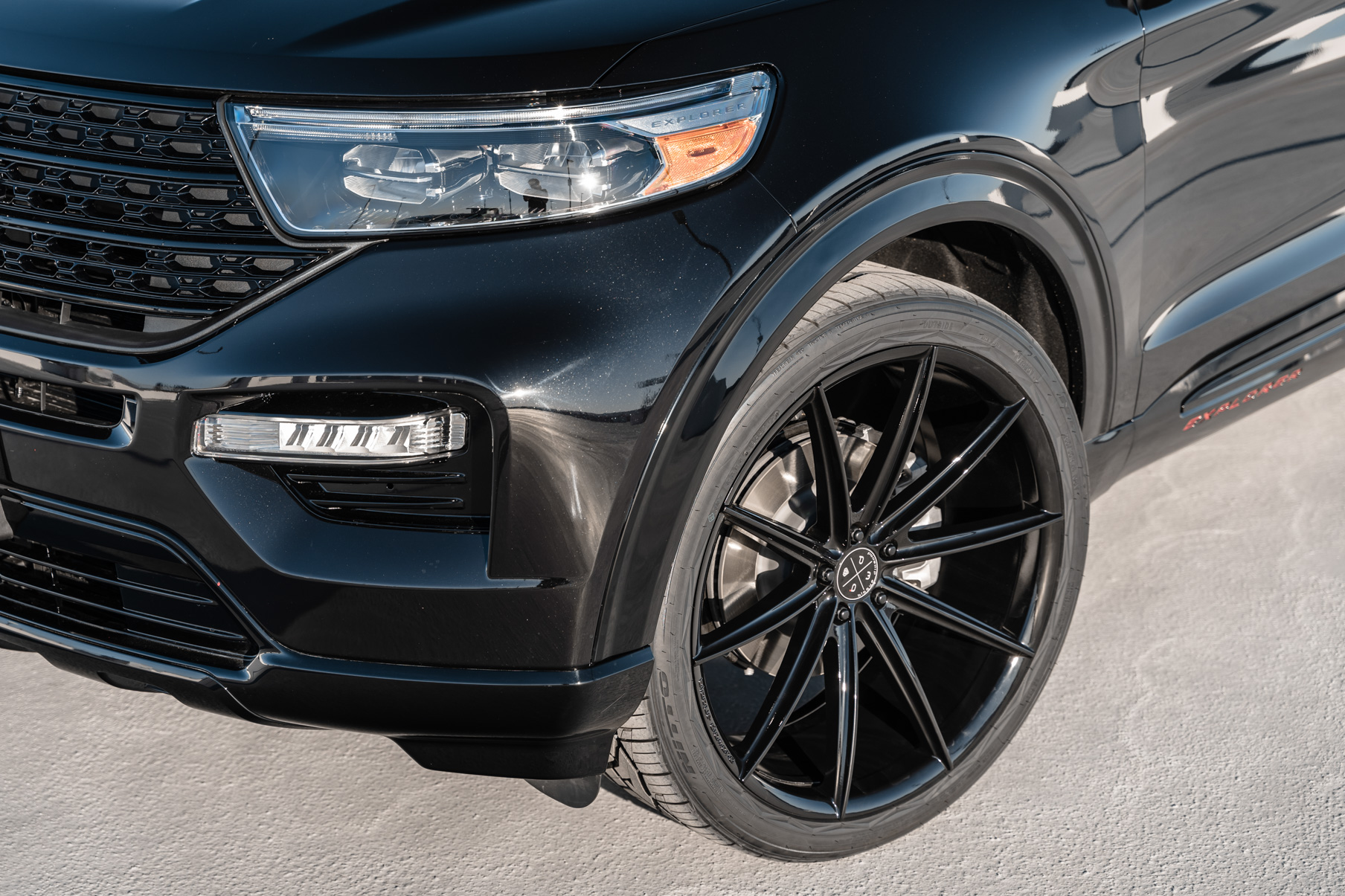 A 2021 Ford Explorer on 24 Inch Blaque Diamond BD-11 Gloss Black Wheels