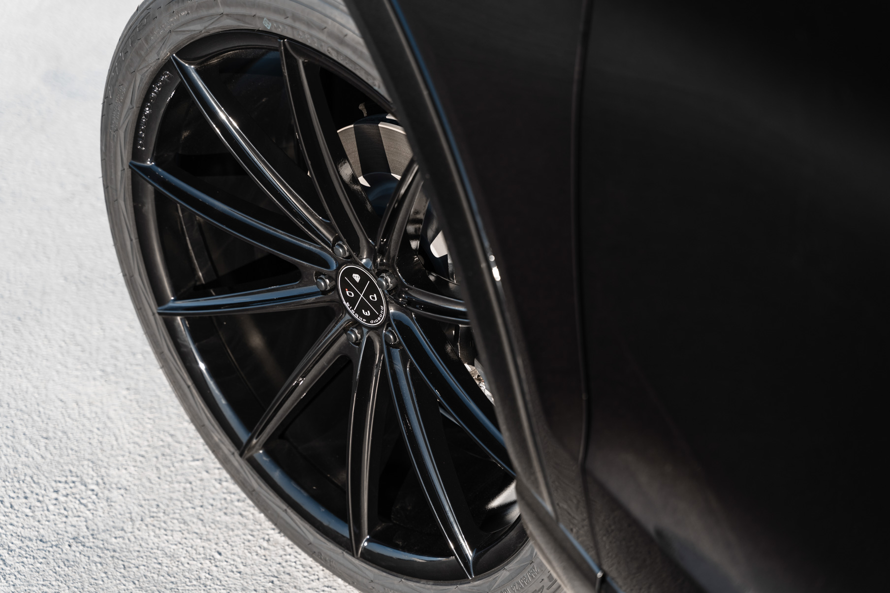 A 2021 Ford Explorer on 24 Inch Blaque Diamond BD-11 Gloss Black Wheels