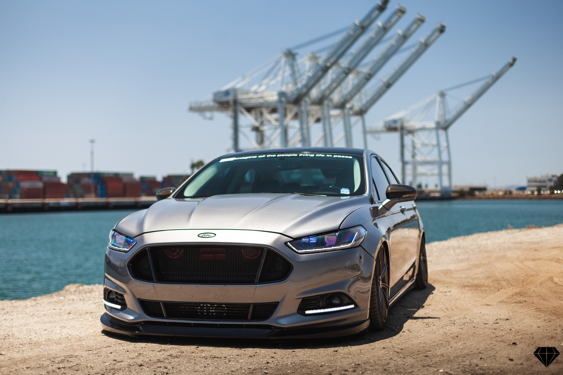 A 2013 Ford Fusion on Blaque Diamond BD-11 Gloss Black Wheels
