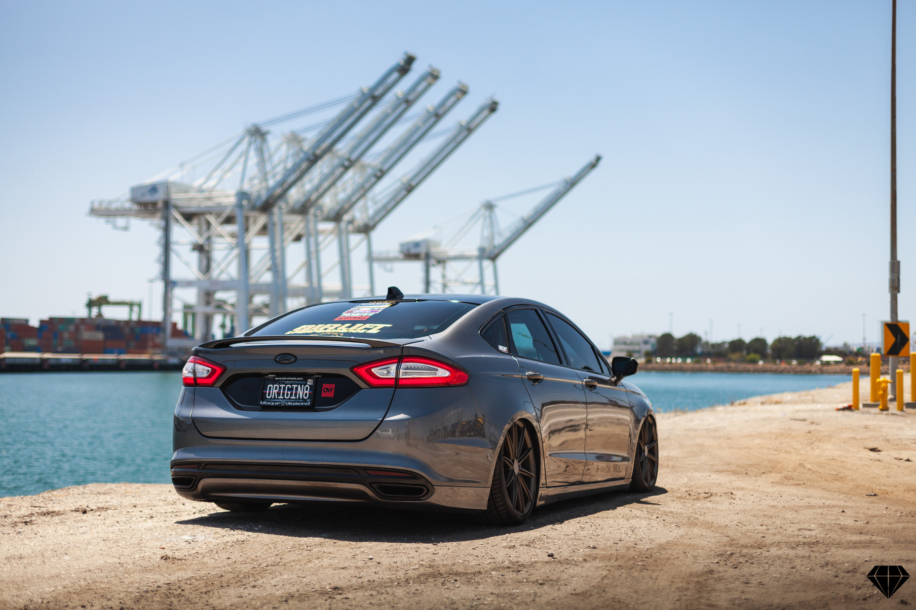 A 2013 Ford Fusion on Blaque Diamond BD-11 Gloss Black Wheels