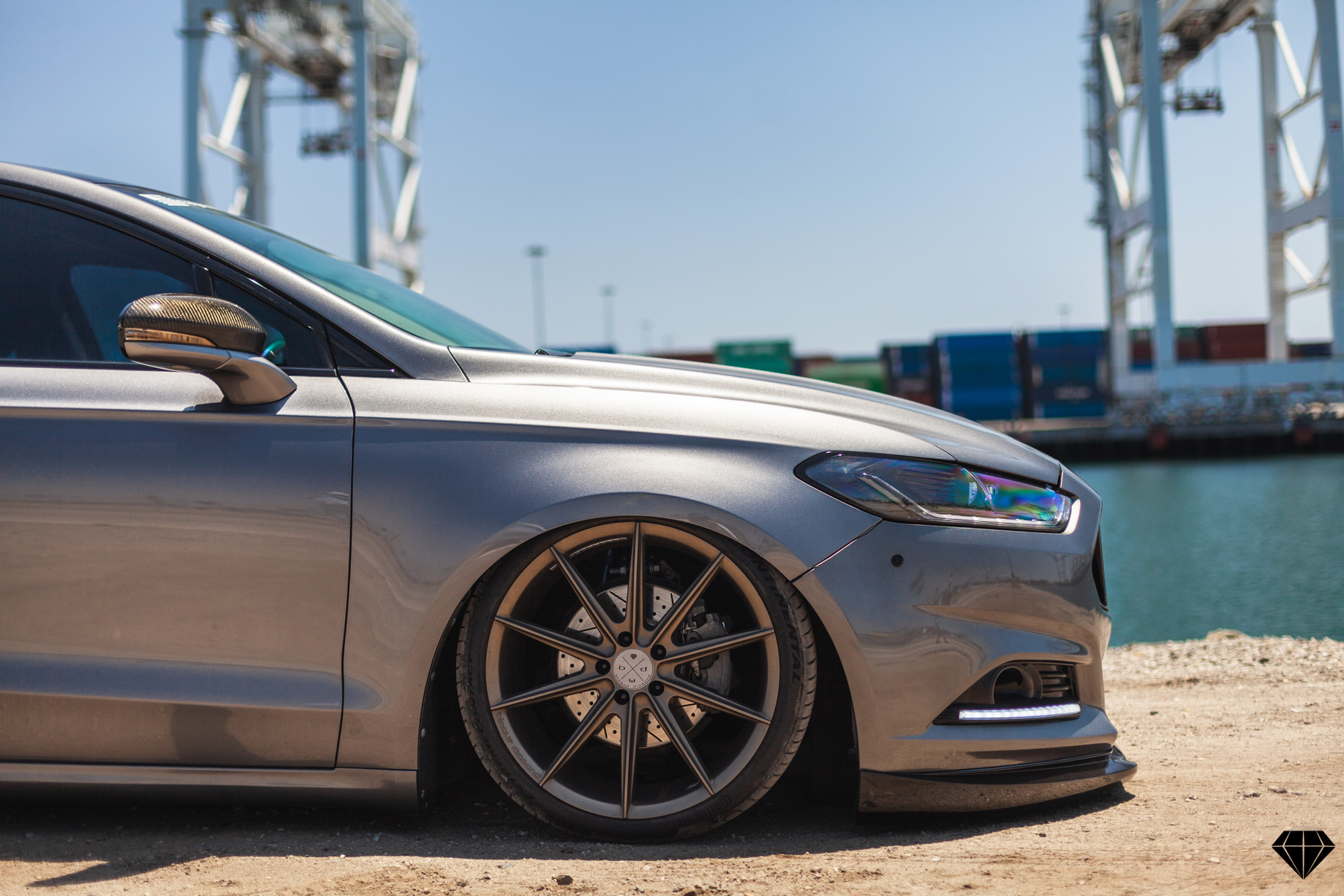 A 2013 Ford Fusion on Blaque Diamond BD-11 Gloss Black Wheels