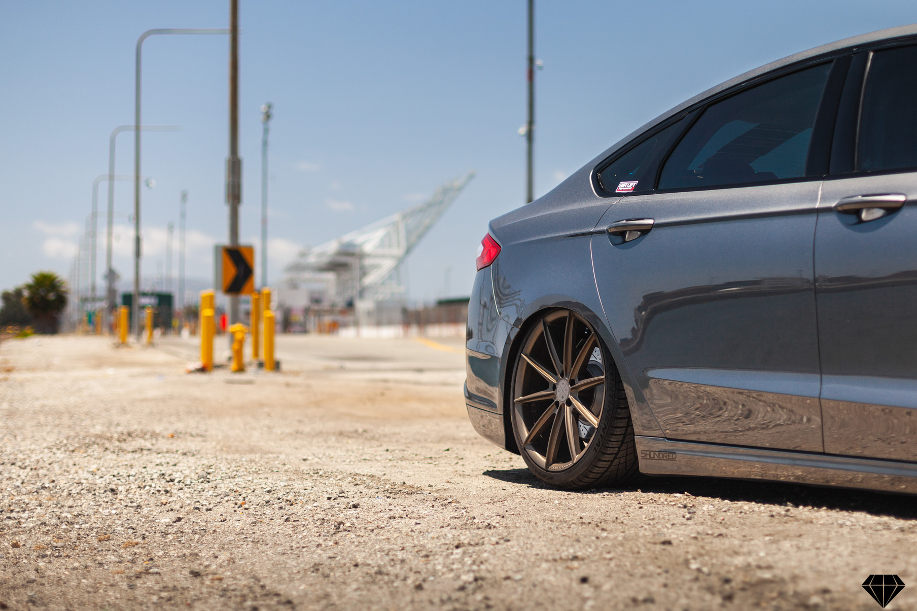 A 2013 Ford Fusion on Blaque Diamond BD-11 Gloss Black Wheels
