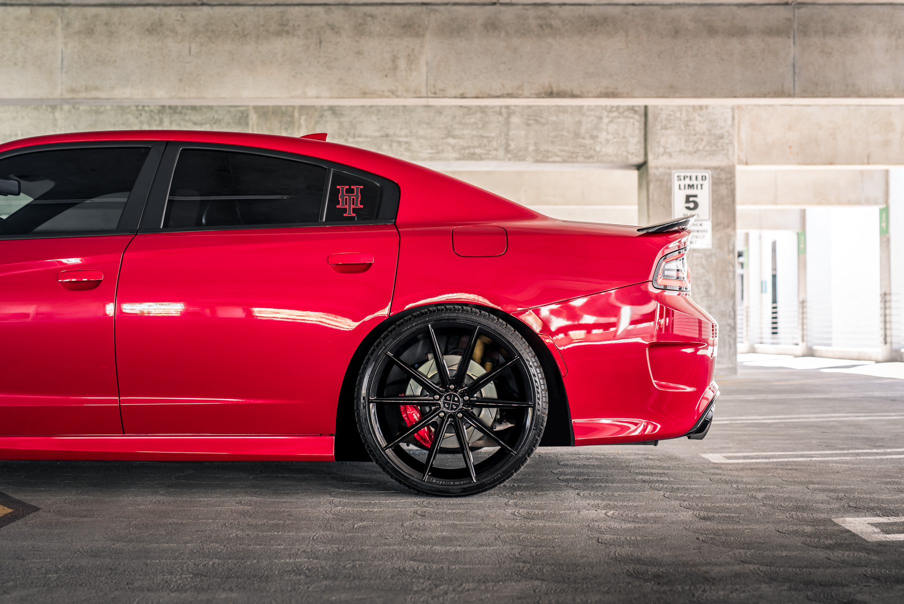 A 2016 Dodge Charger SRT on Blaque Diamond BD-11 Gloss Black Wheels