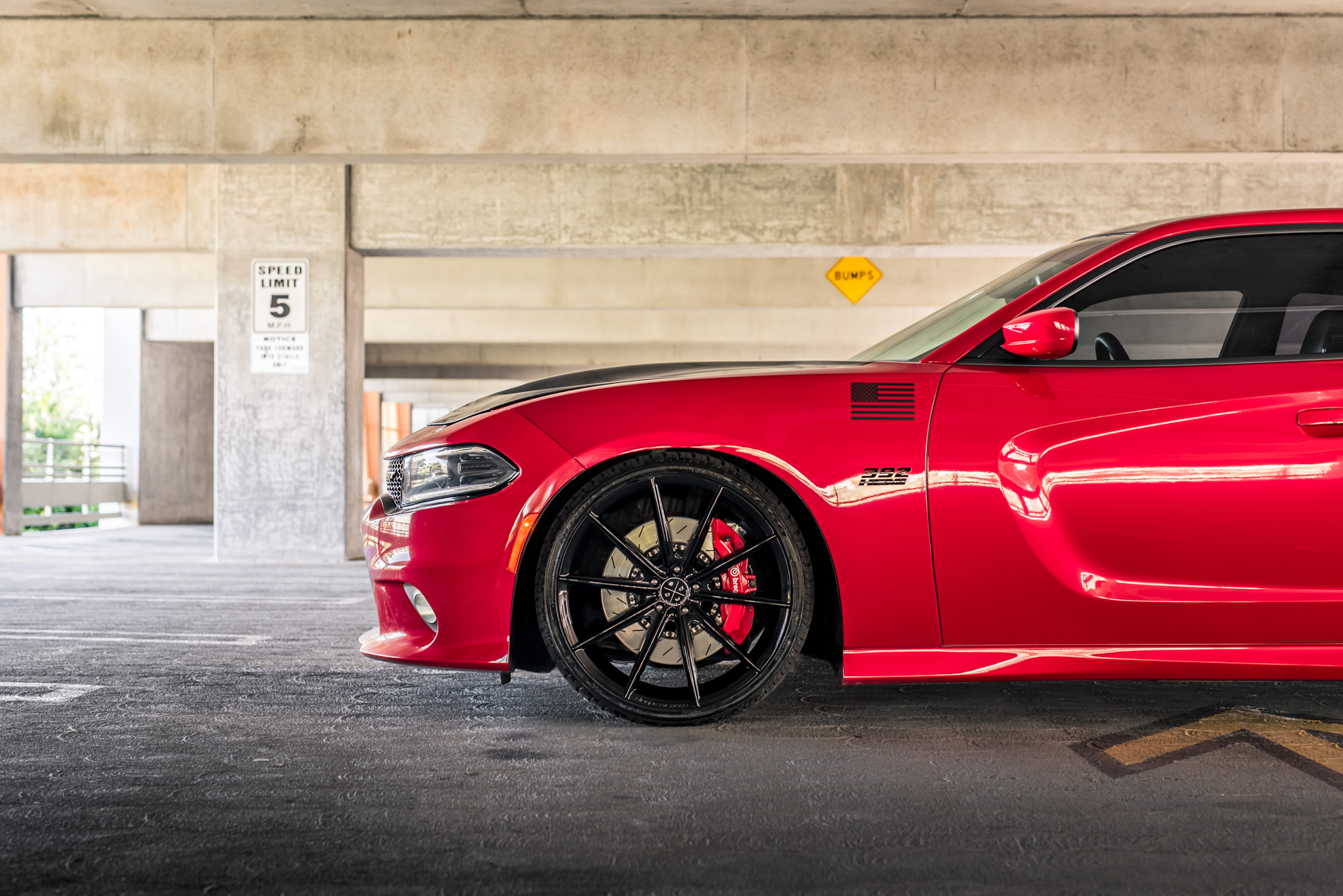 A 2016 Dodge Charger SRT on Blaque Diamond BD-11 Gloss Black Wheels