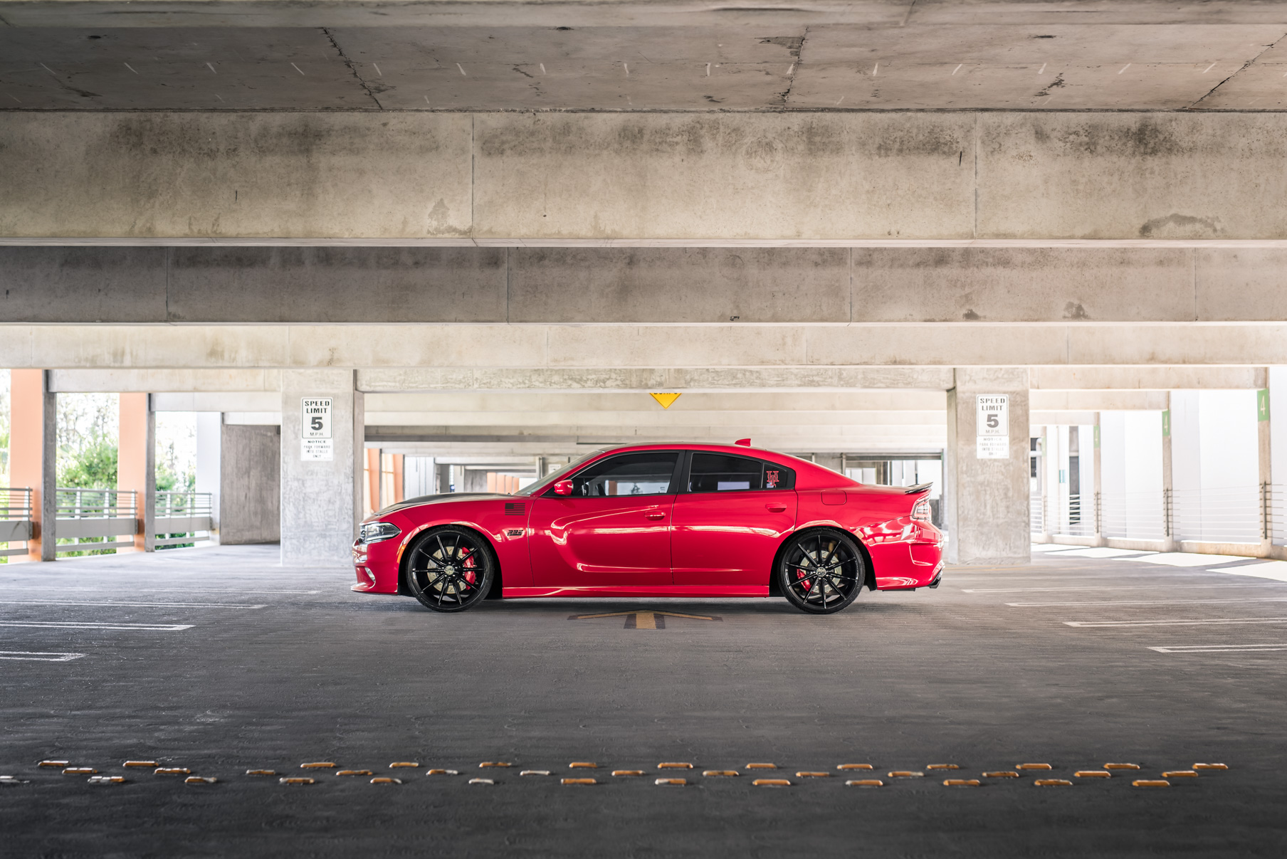 A 2016 Dodge Charger SRT on Blaque Diamond BD-11 Gloss Black Wheels
