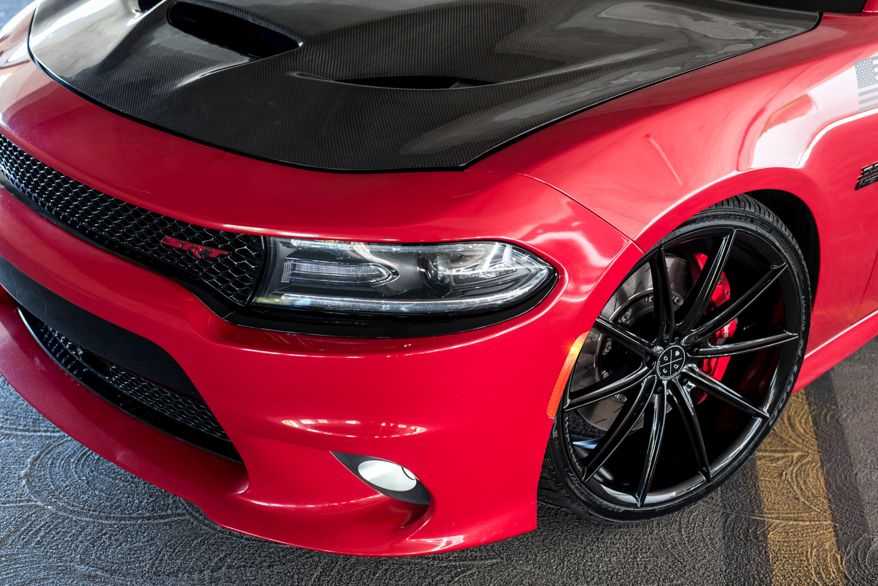A 2016 Dodge Charger SRT on Blaque Diamond BD-11 Gloss Black Wheels