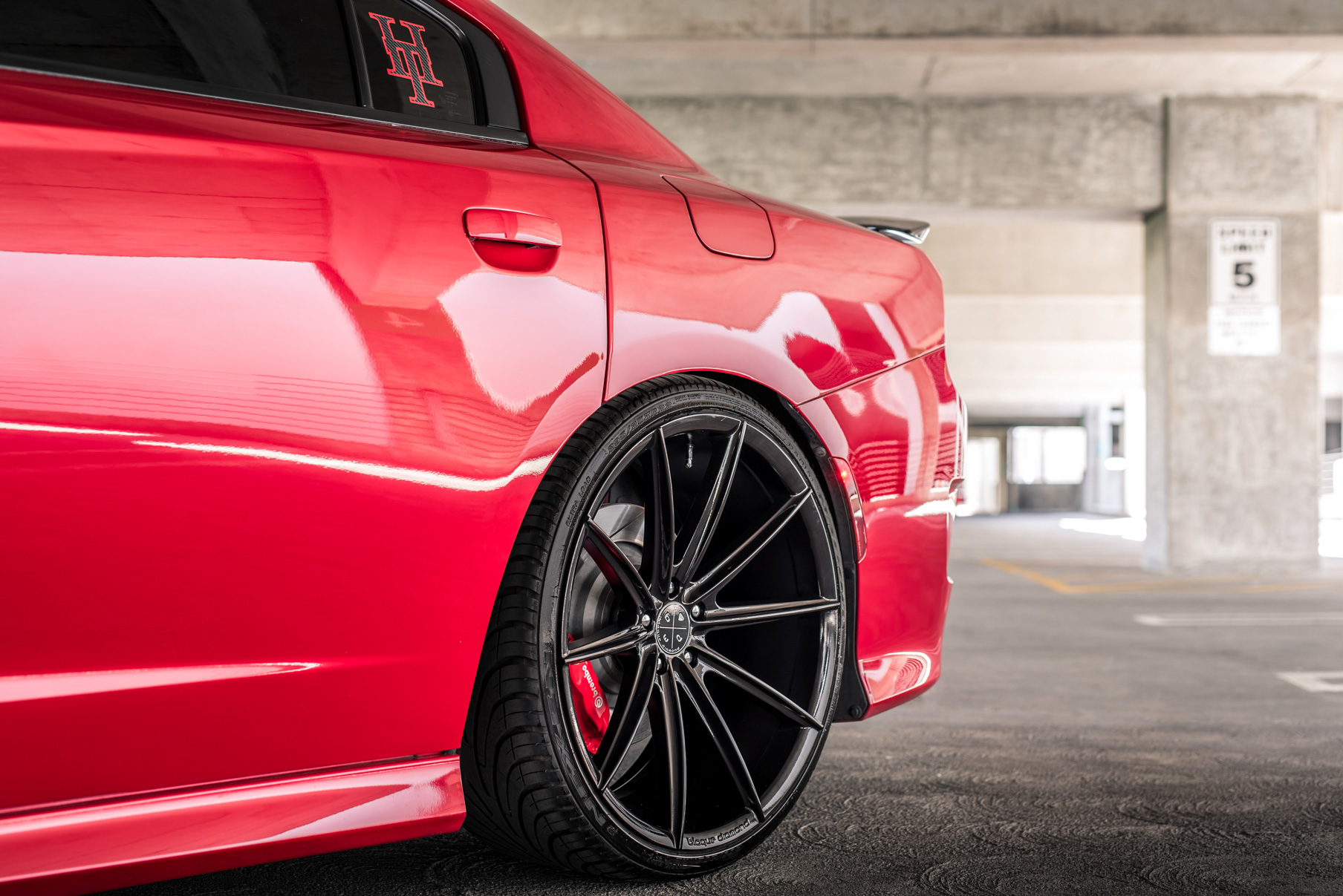 A 2016 Dodge Charger SRT on Blaque Diamond BD-11 Gloss Black Wheels