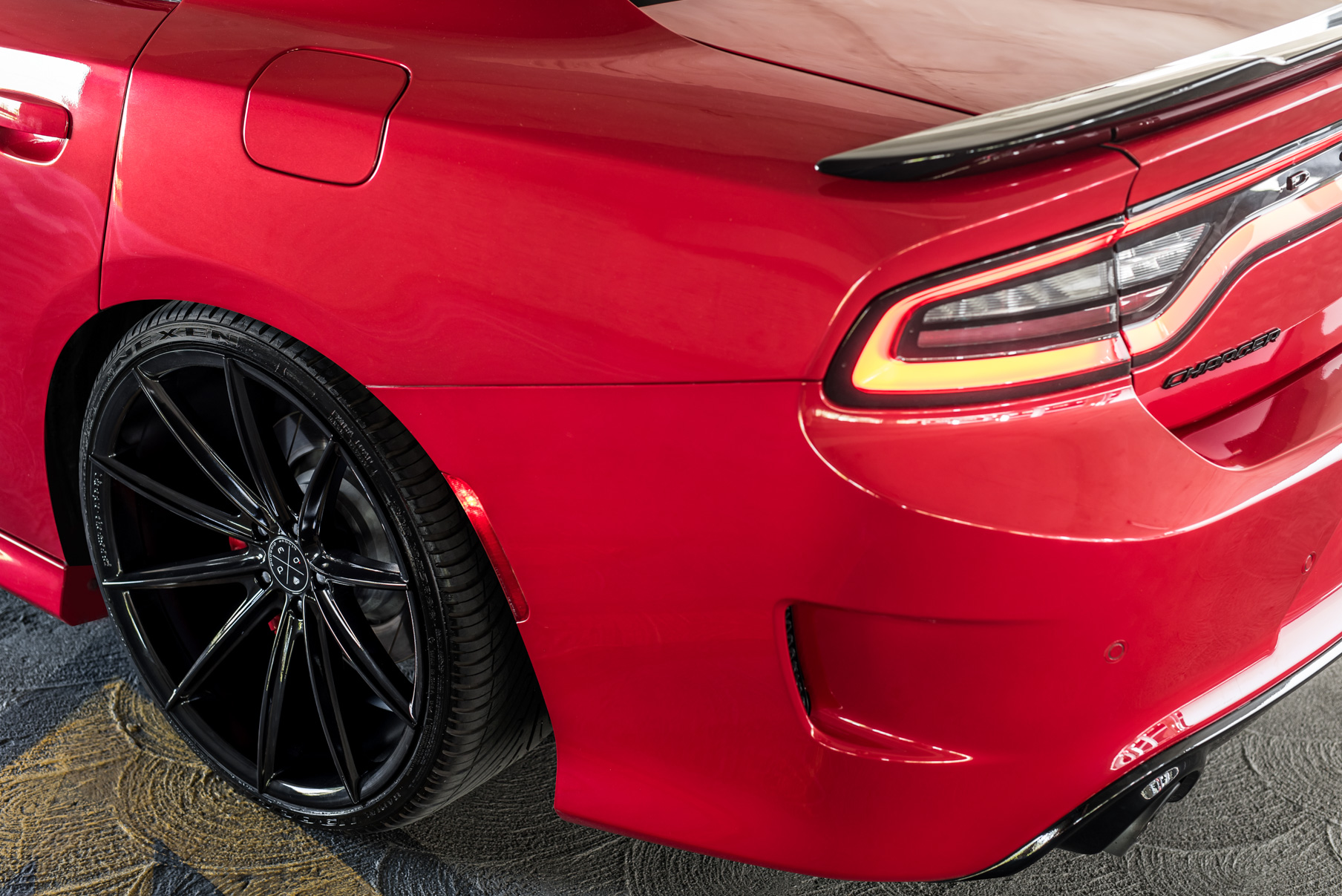 A 2016 Dodge Charger SRT on Blaque Diamond BD-11 Gloss Black Wheels