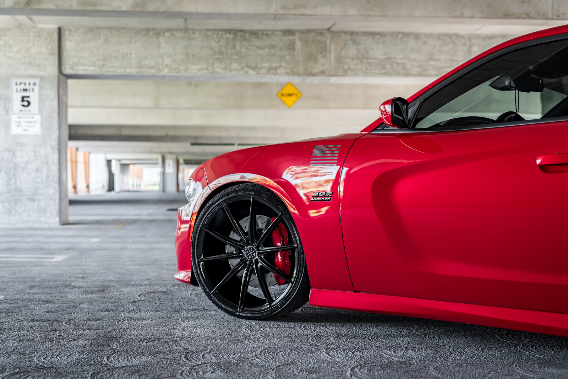 A 2016 Dodge Charger SRT on Blaque Diamond BD-11 Gloss Black Wheels