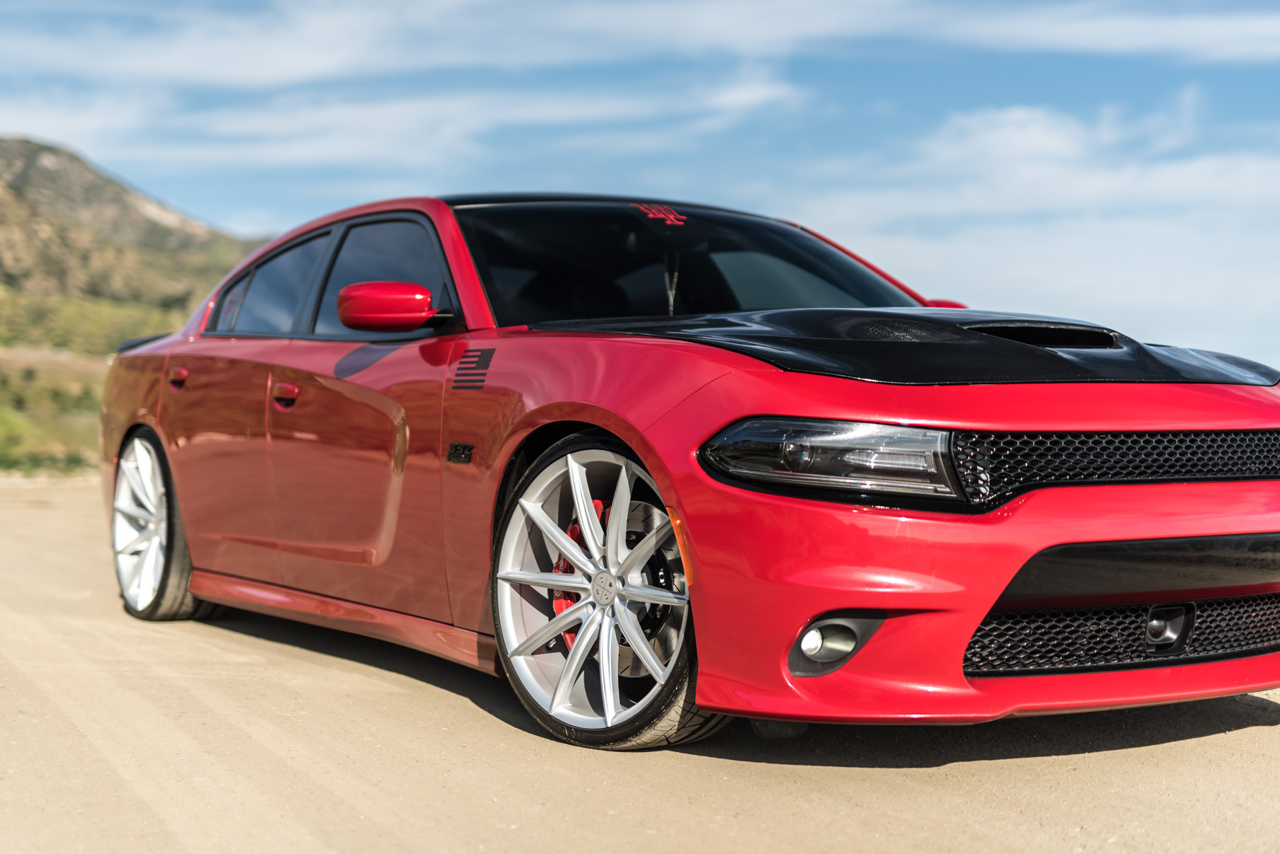 A 2016 Dodge Charger SRT on Blaque Diamond BD-11 Gloss Black Wheels