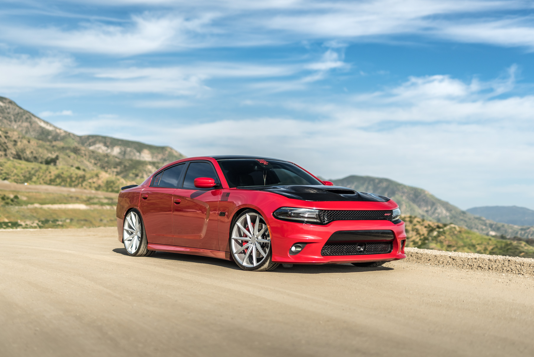 A 2016 Dodge Charger SRT on Blaque Diamond BD-11 Gloss Black Wheels