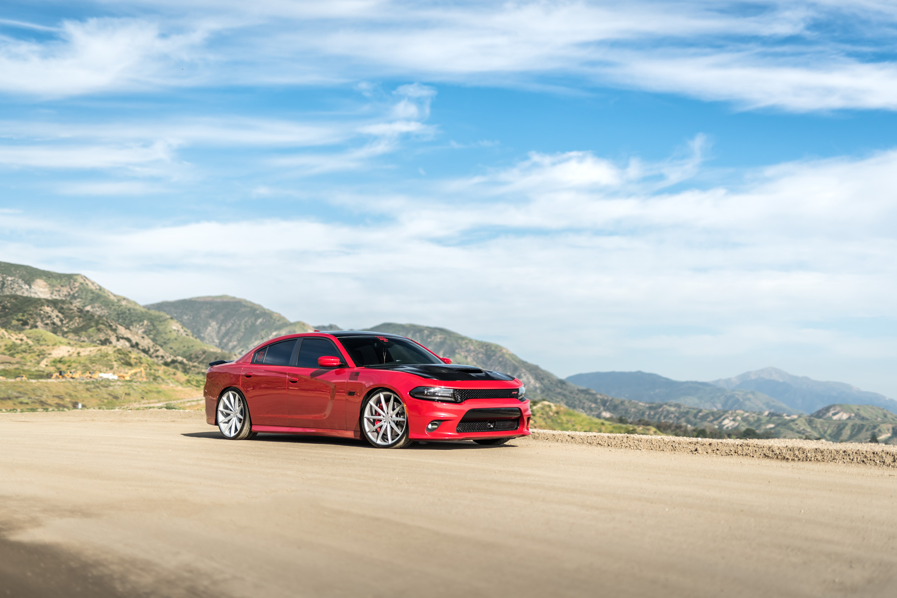 A 2016 Dodge Charger SRT on Blaque Diamond BD-11 Gloss Black Wheels