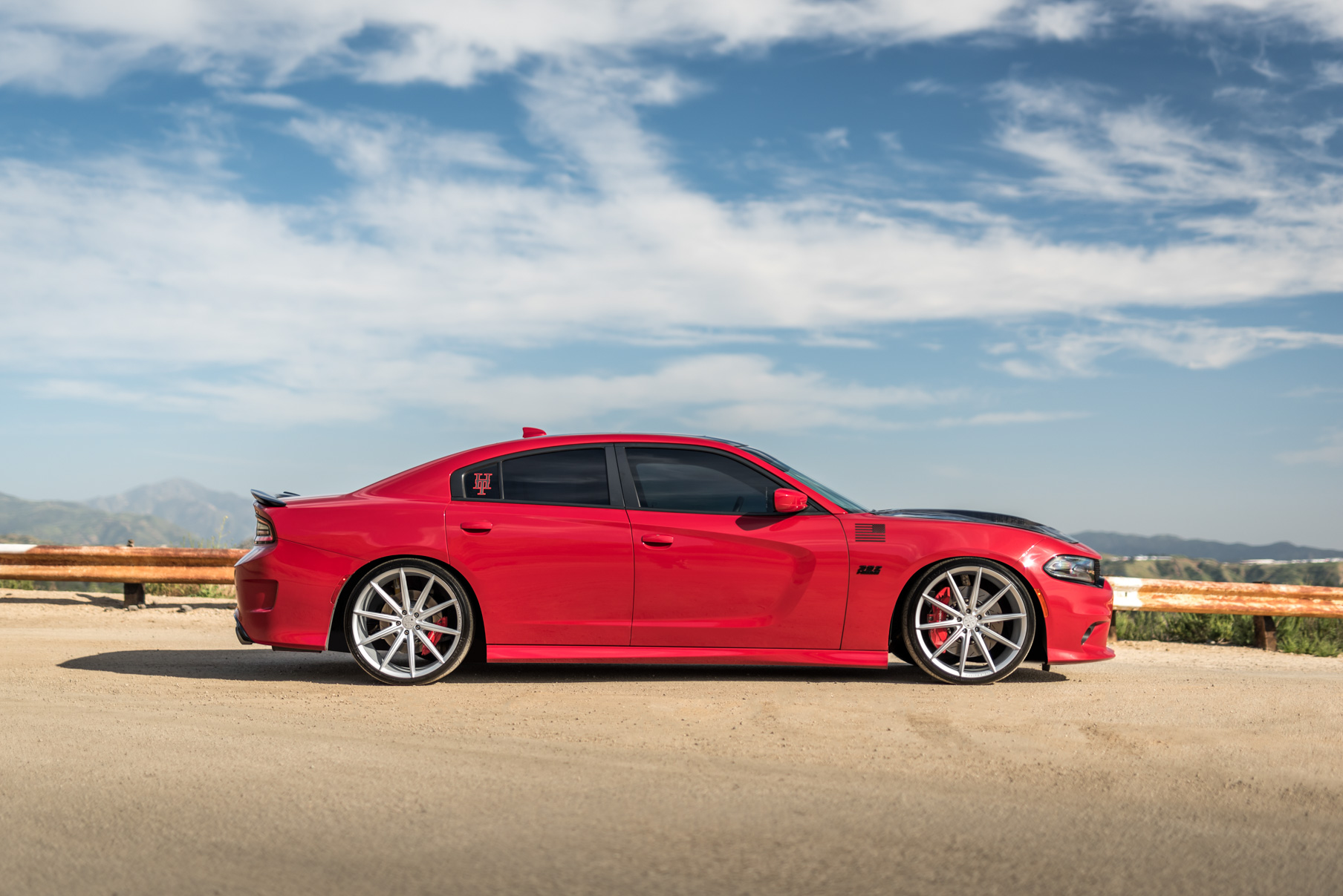 A 2016 Dodge Charger SRT on Blaque Diamond BD-11 Gloss Black Wheels