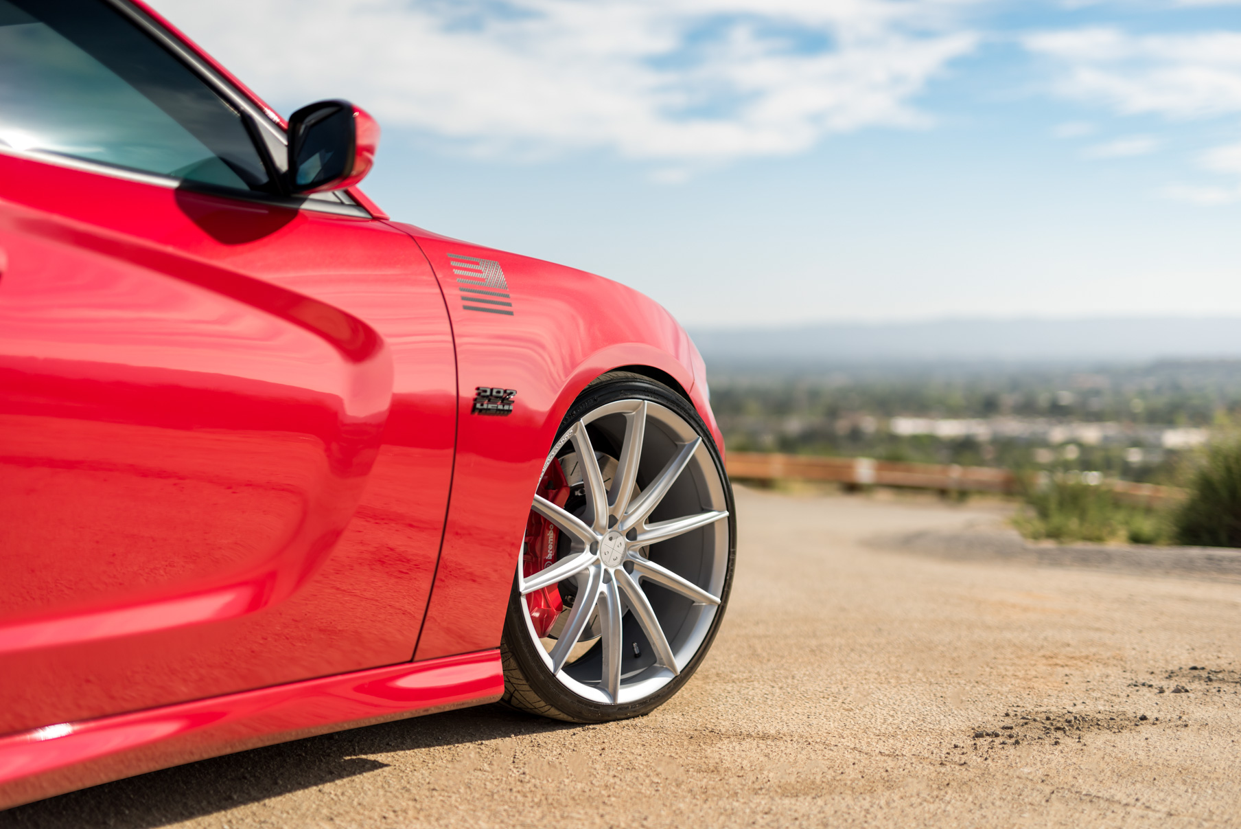 A 2016 Dodge Charger SRT on Blaque Diamond BD-11 Gloss Black Wheels