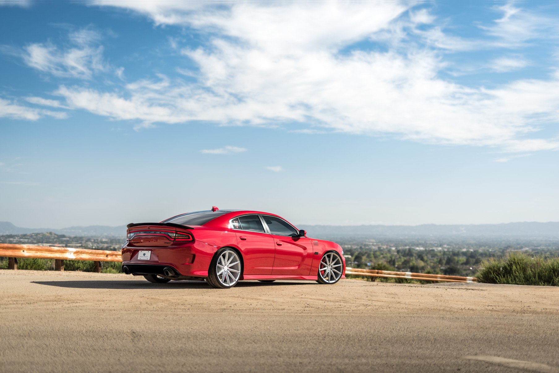 A 2016 Dodge Charger SRT on Blaque Diamond BD-11 Gloss Black Wheels