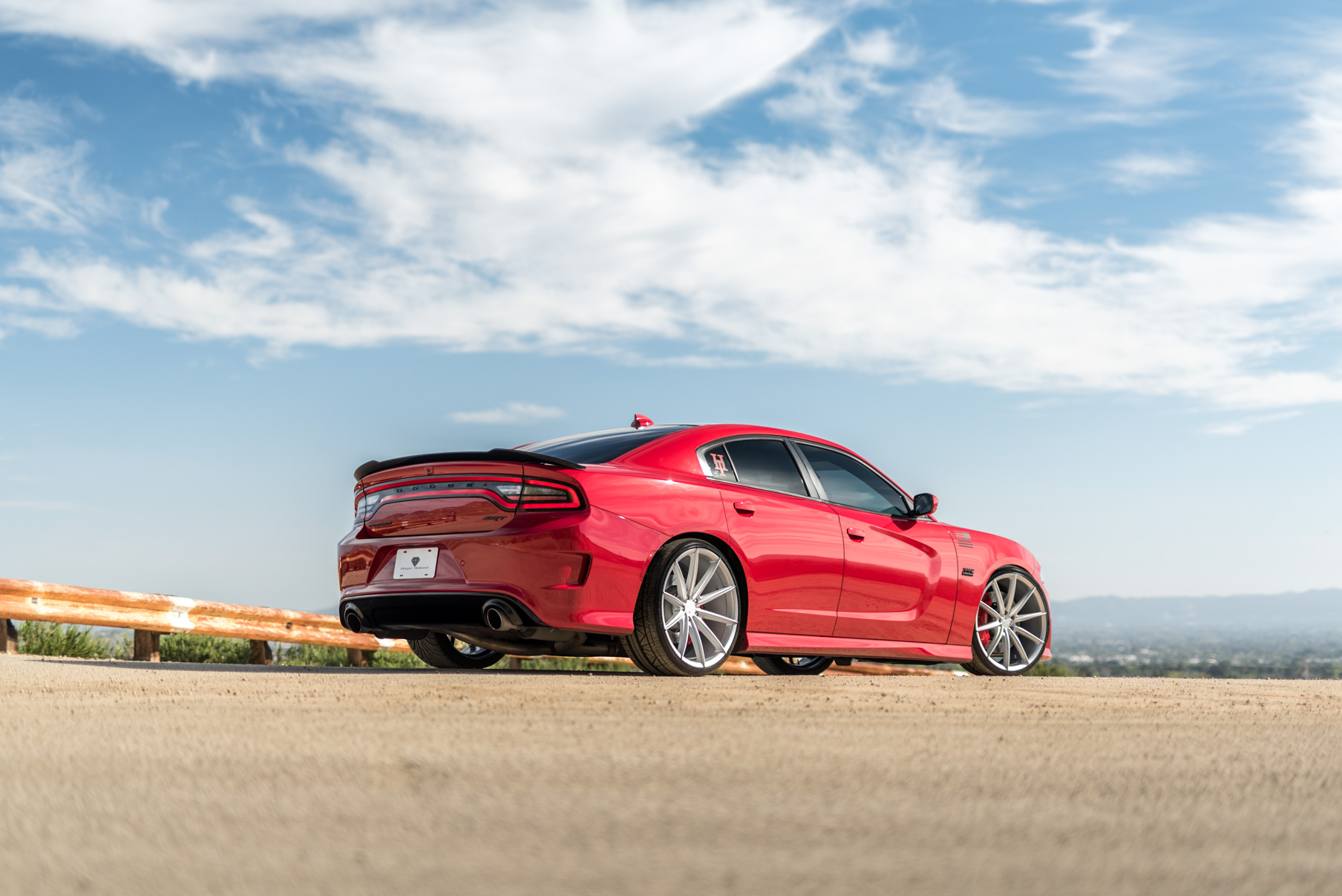 A 2016 Dodge Charger SRT on Blaque Diamond BD-11 Gloss Black Wheels