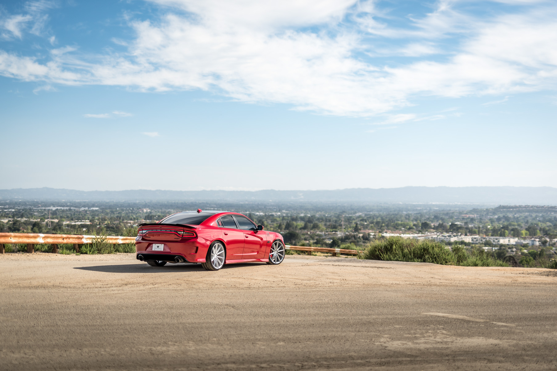 A 2016 Dodge Charger SRT on Blaque Diamond BD-11 Gloss Black Wheels